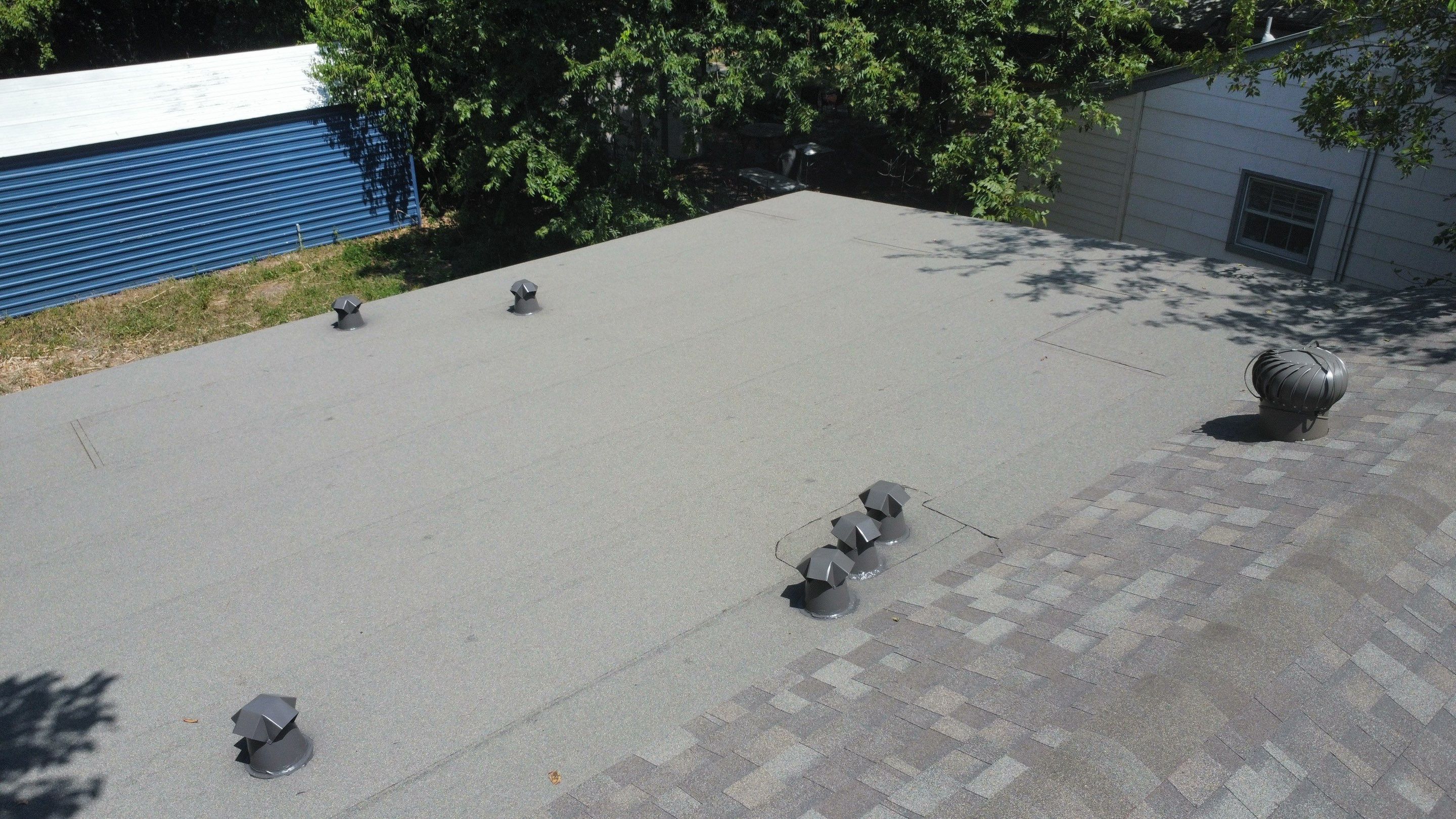 Mixed Roof System – Oakridge Driftwood + Flat Roof Section | Austin, TX by Kstylez Roofing & Construction