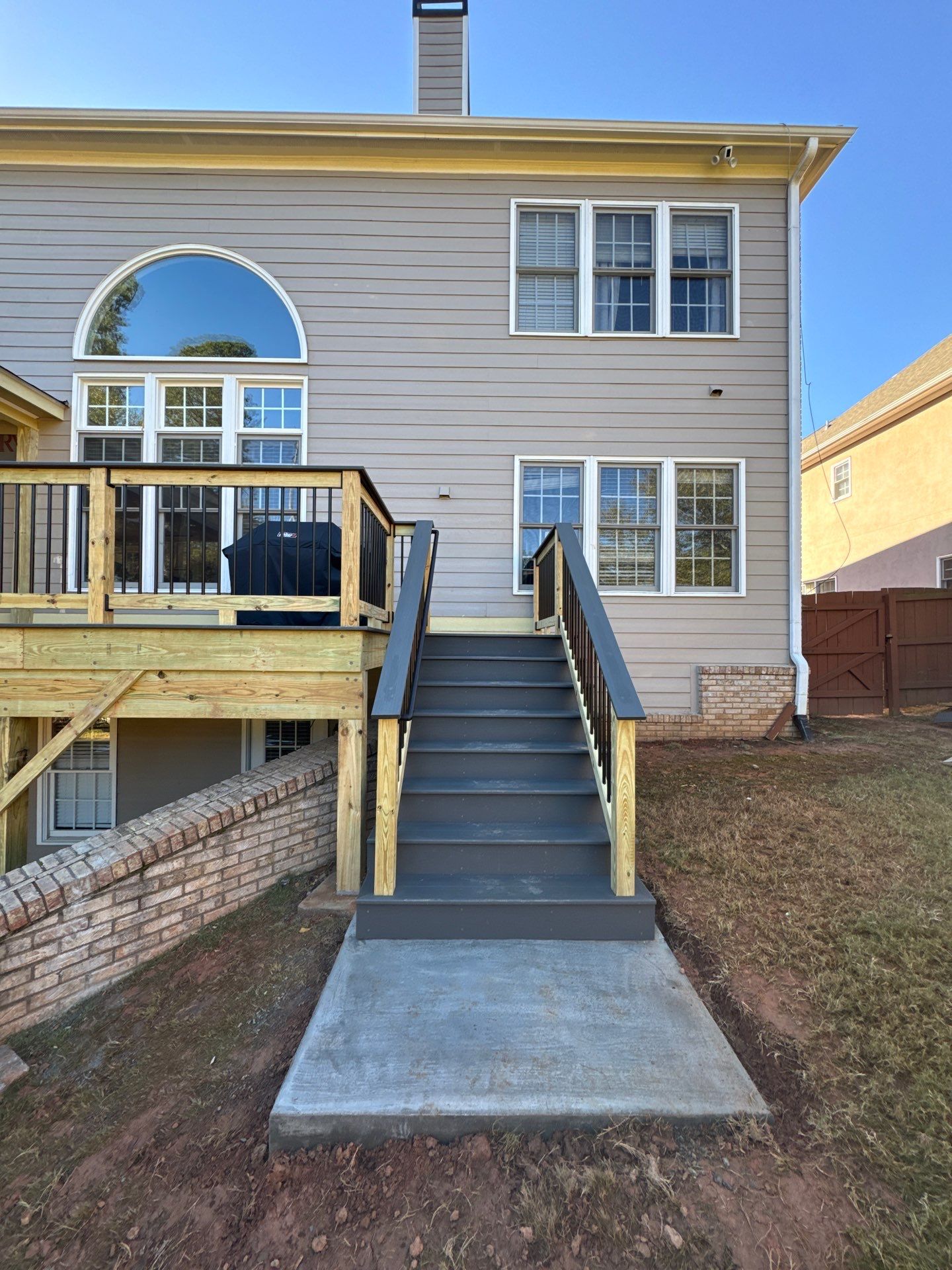 Custom Composite Deck and Covered Gabled Porch in Marietta by Swift Home Renovations