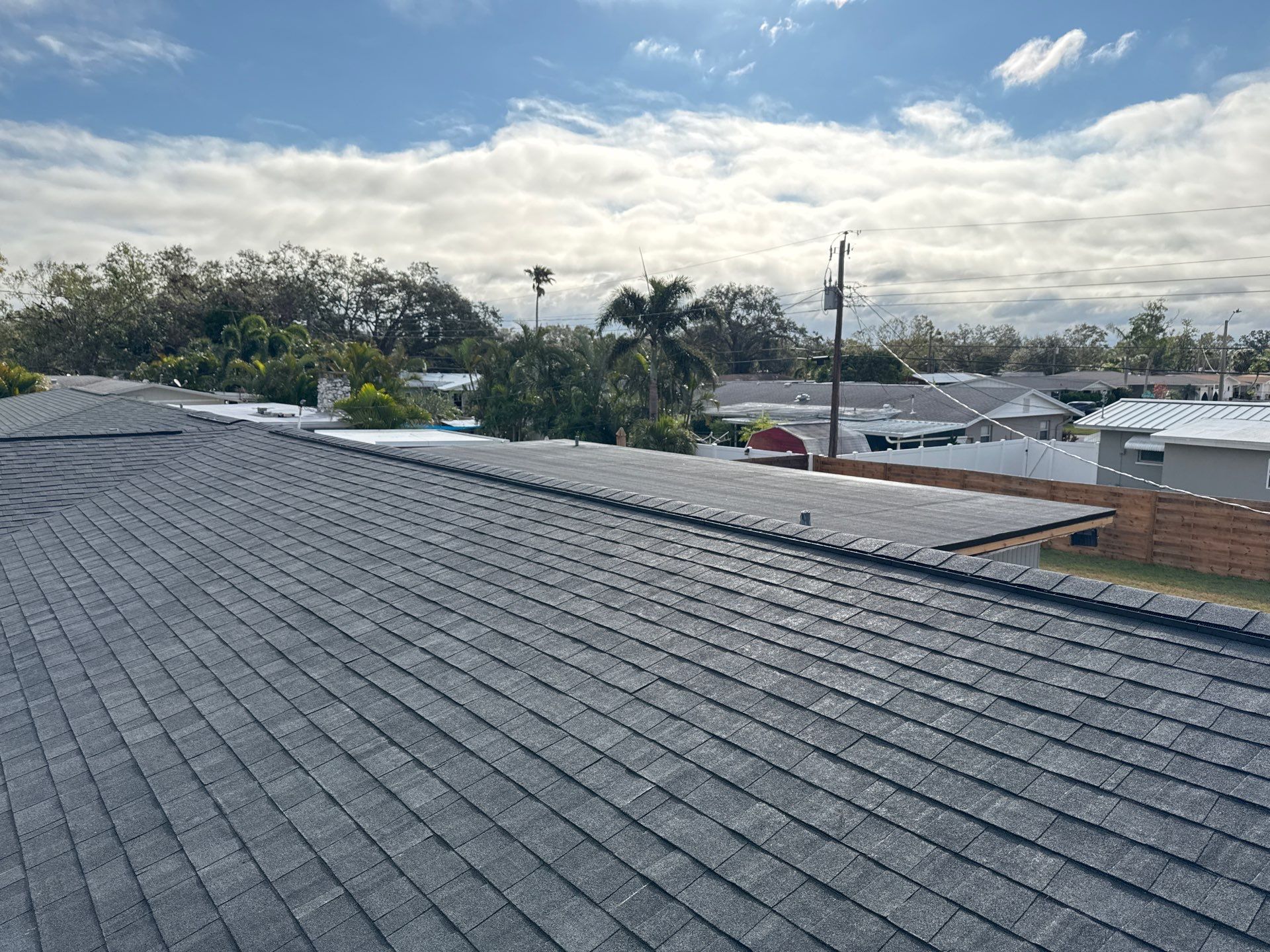 Onyx Black Shingles by Reimagine Roofing