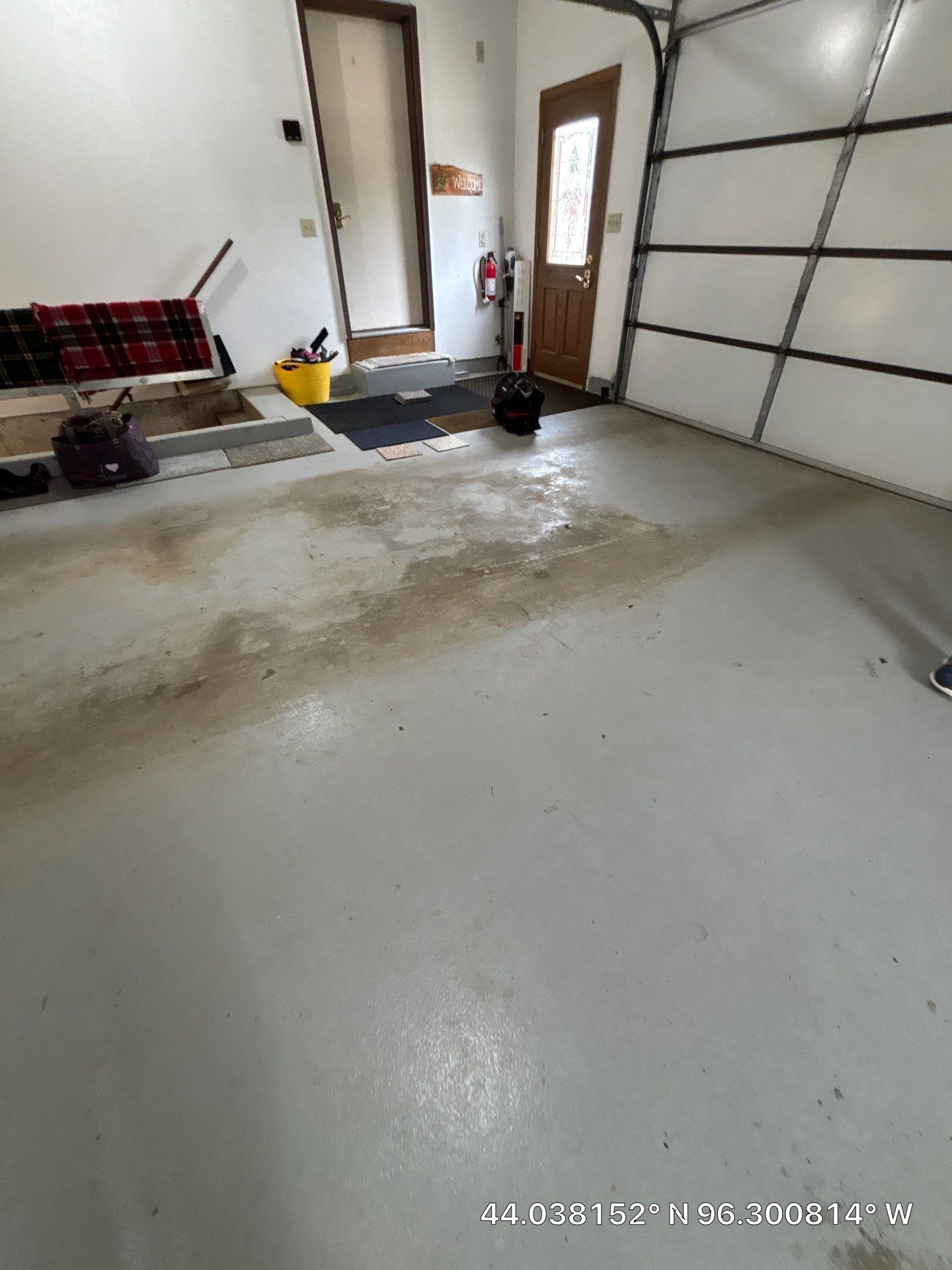 Custom Polyaspartic Garage Floor and Stairwell Coating in Pipestone by Select Painting, Coatings & Garage Cabinets