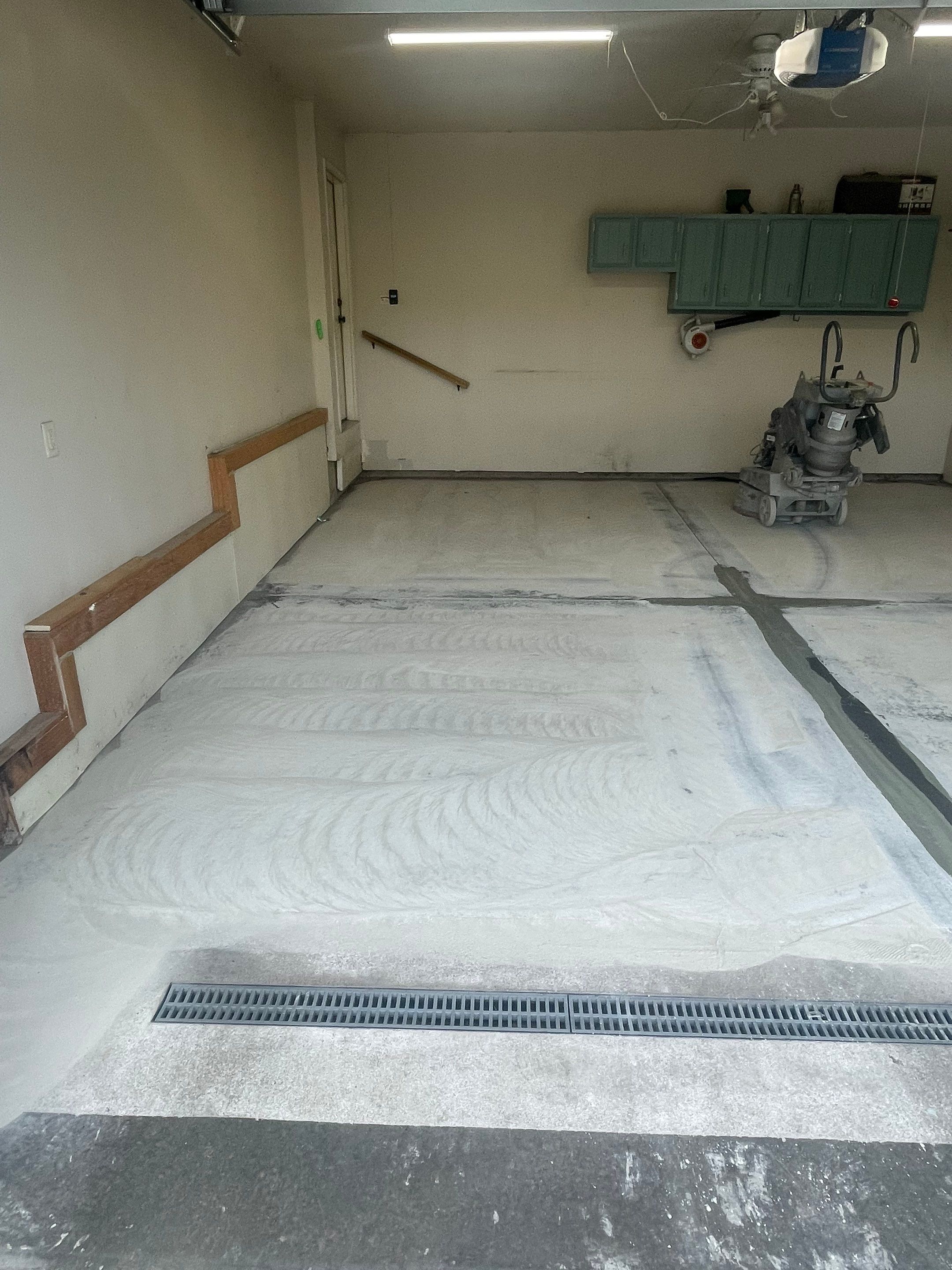 Multi-Stall Garage Floor Coating Installation in Sioux Falls by Select Painting, Coatings & Garage Cabinets