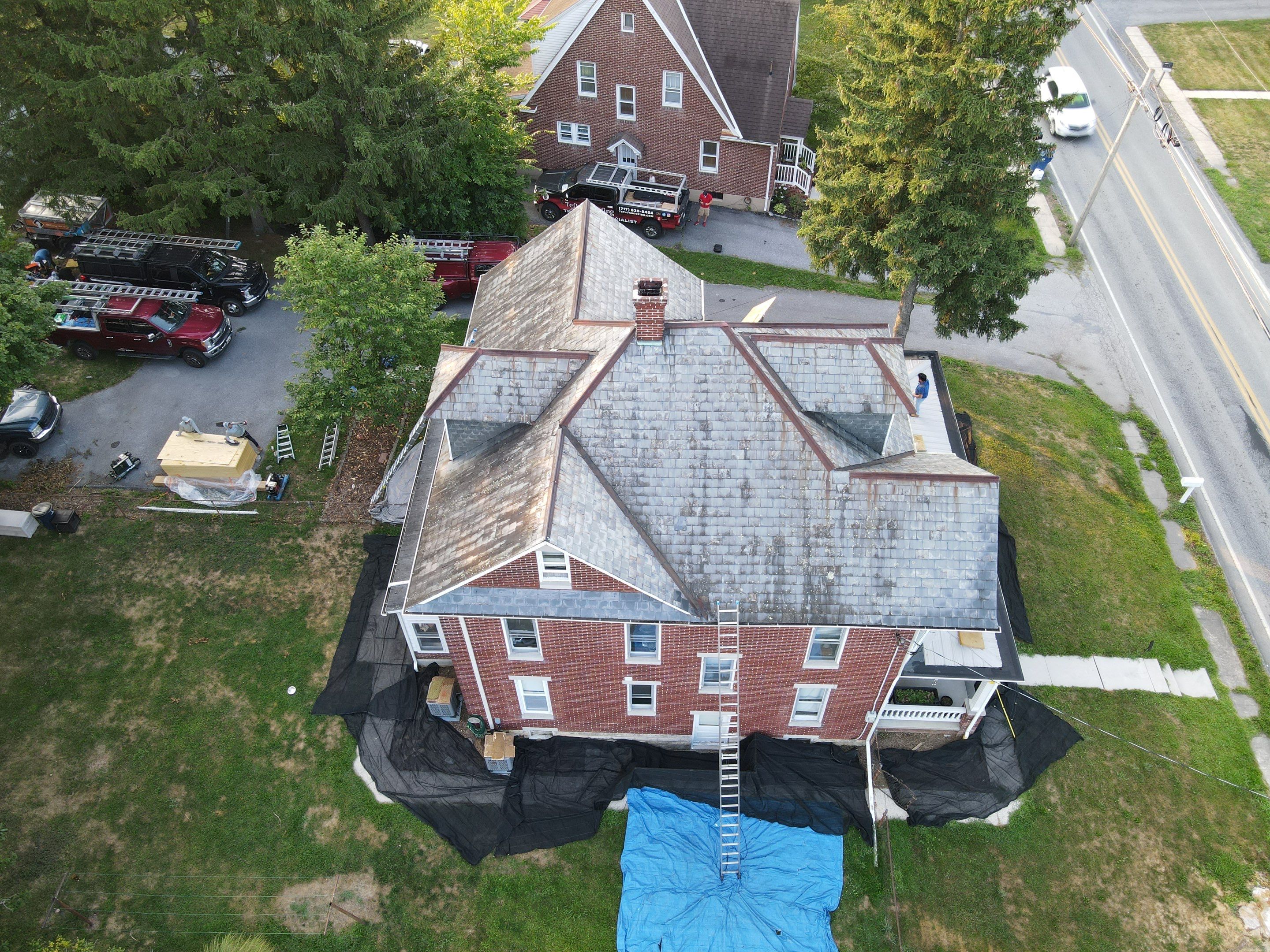 Slate Roof Removal  by Teflon Roofing