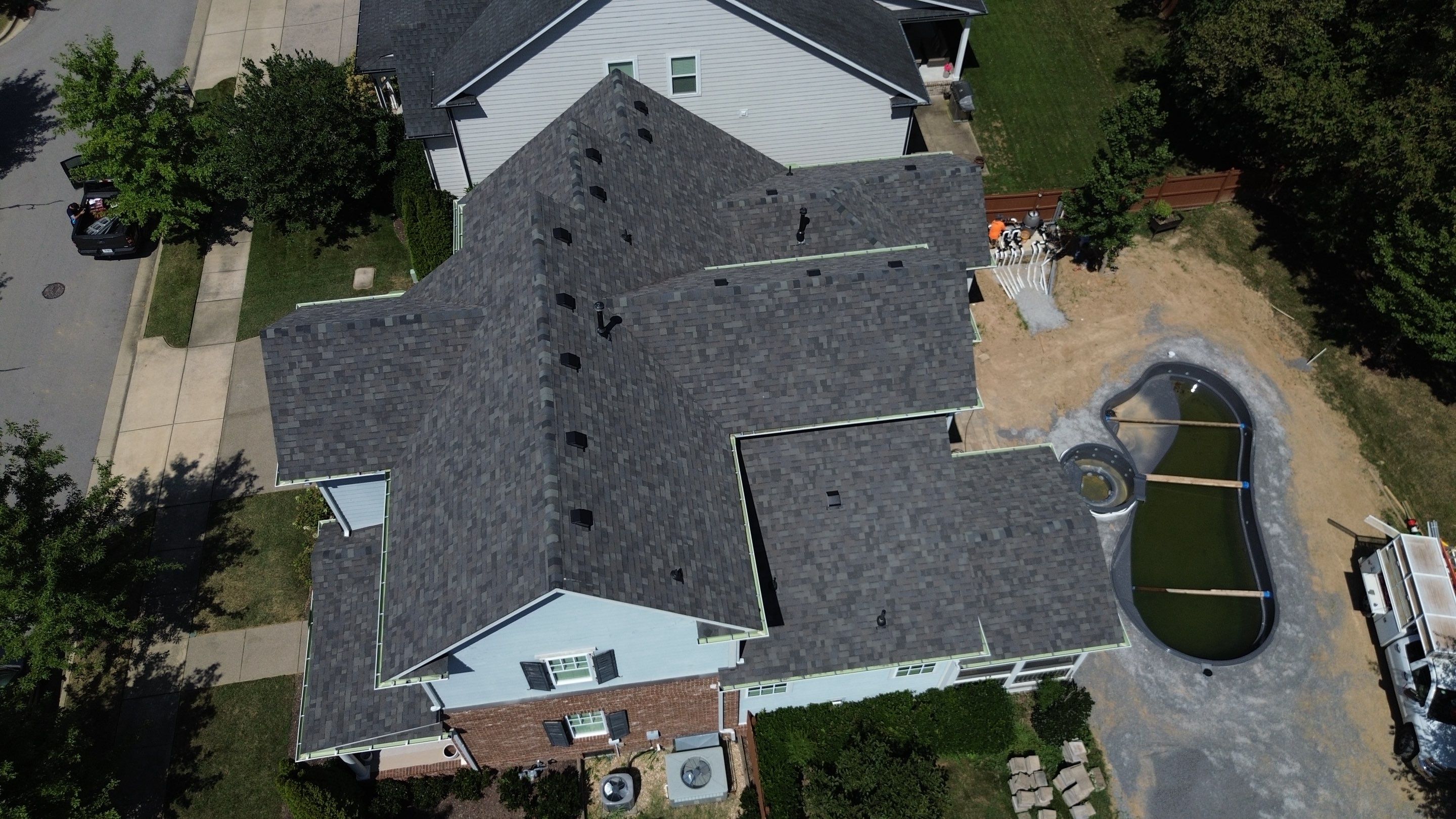 Malarkey Highlander Shingle Roof and Gutter Replacement in Franklin by Shinglesmiths Roofing