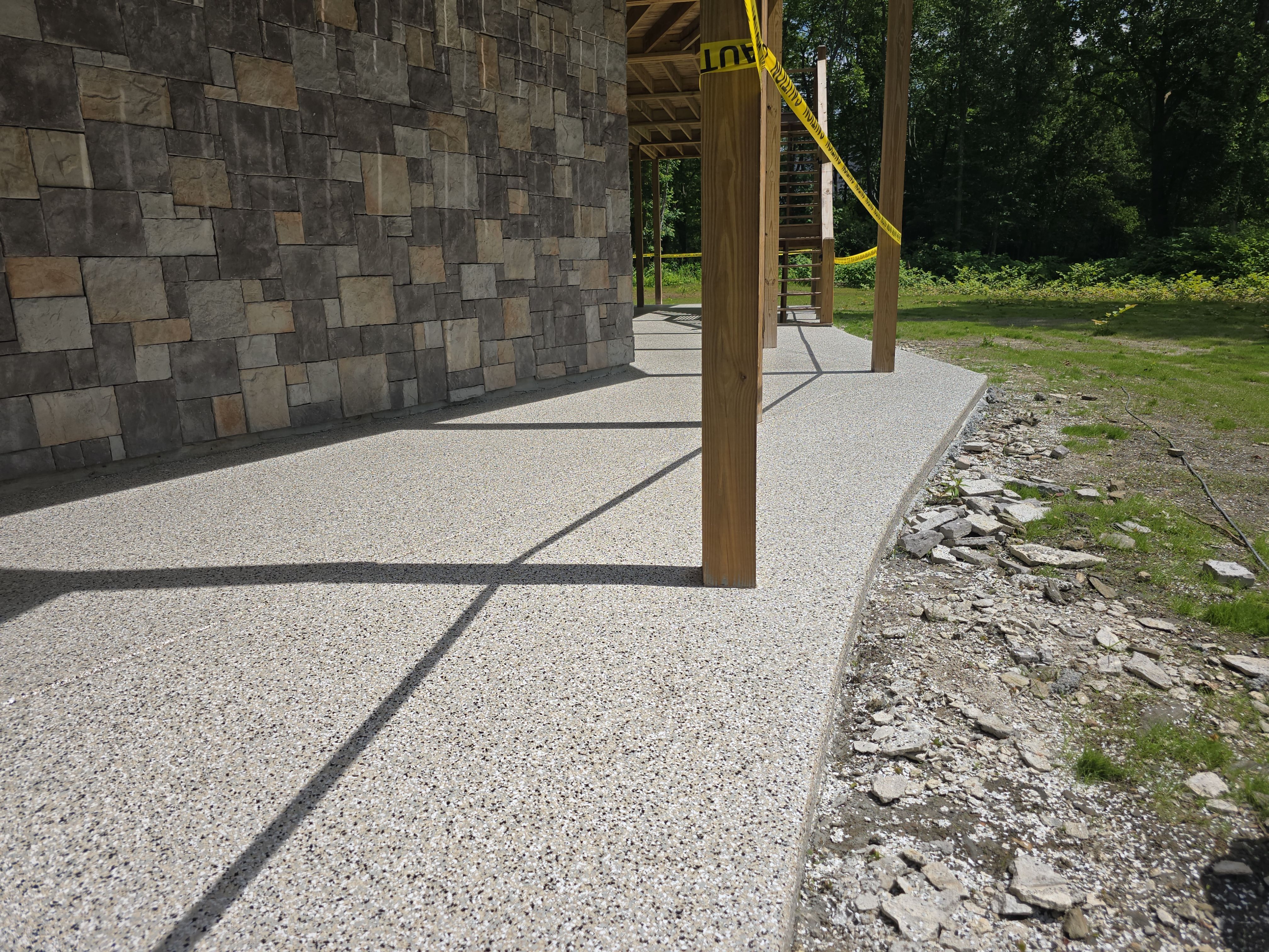 Patio fully transformed using Cabin Fever! by Elite Floor Solutions
