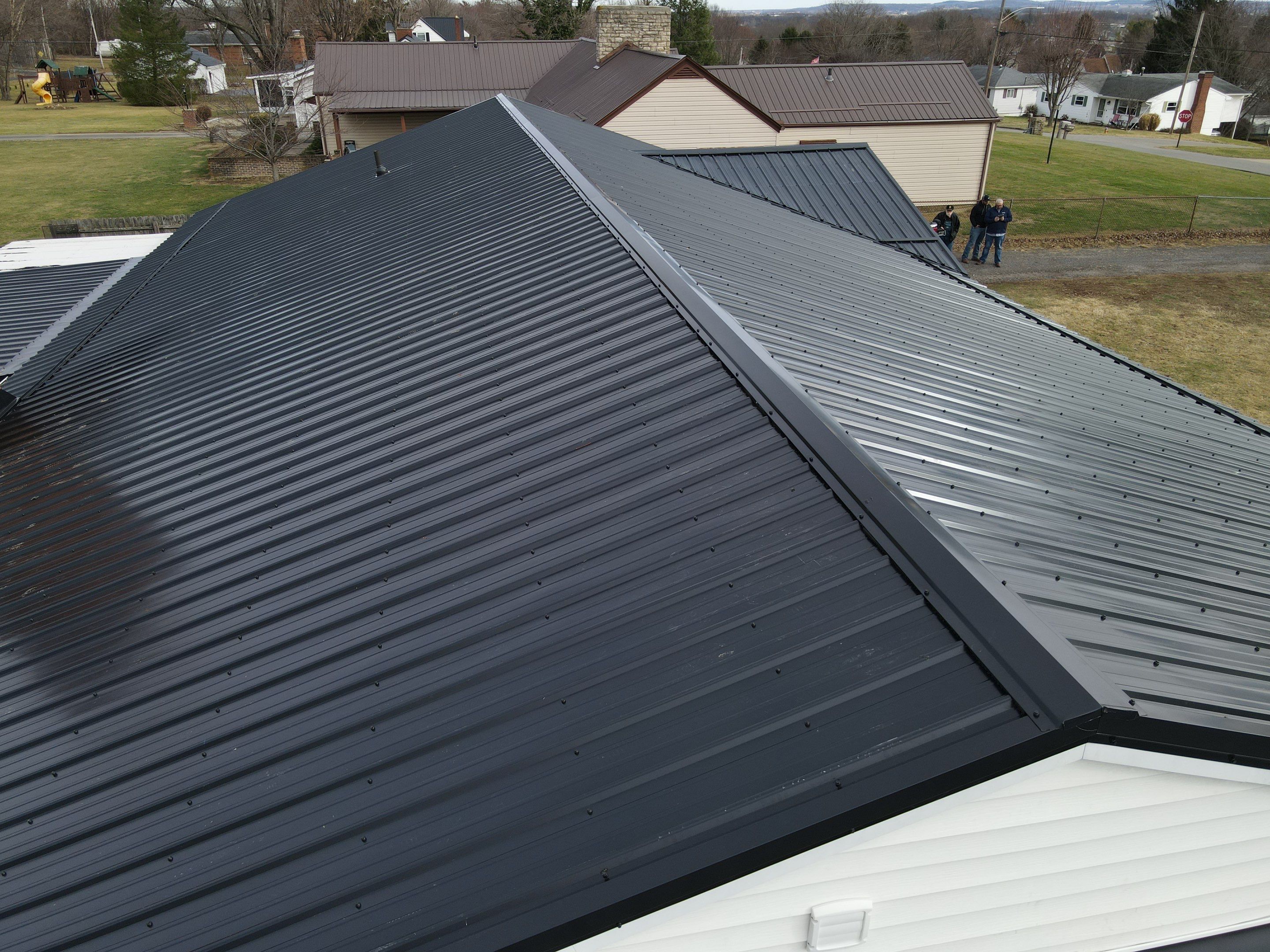 Residential Roofing Installation using Perfromance Panel Metal - Black by RoofX 