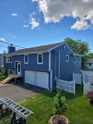 Siding Installation using Certainteed Cedar Impressions Straight Edge Perfection Shingles - D7 - Pacific Blue