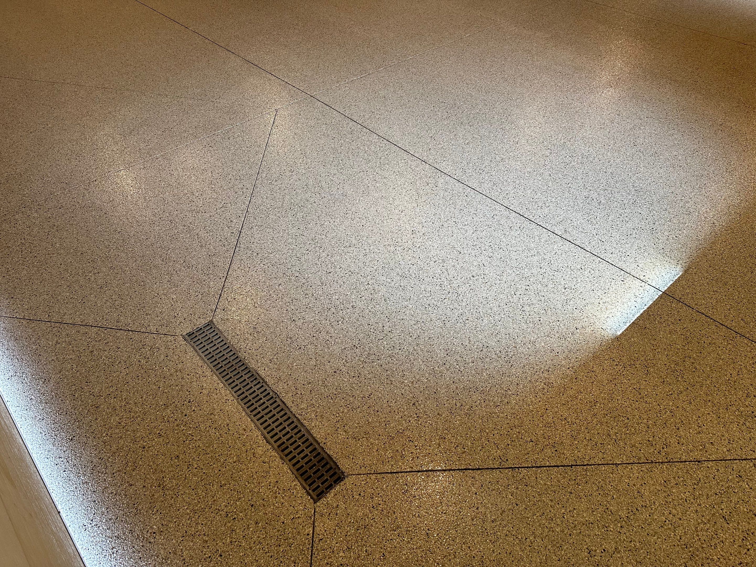 Sioux Falls Garage Floor Concrete Coating with Shoreline Flake Finish by Select Painting, Coatings & Garage Cabinets