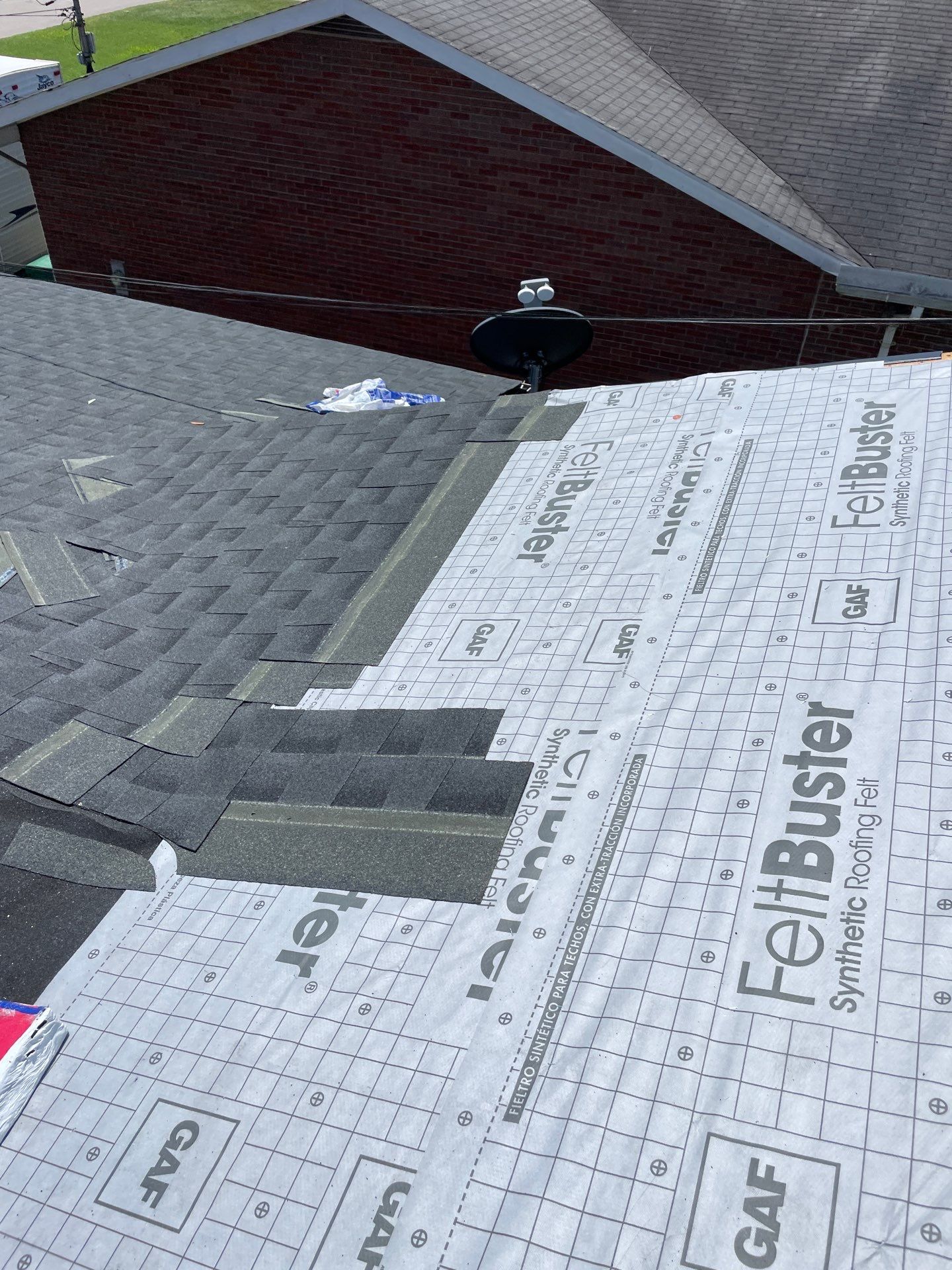 Residential Roofing Installation using GAF Timberline HDZ Charcoal by Rainstoppers Roofing