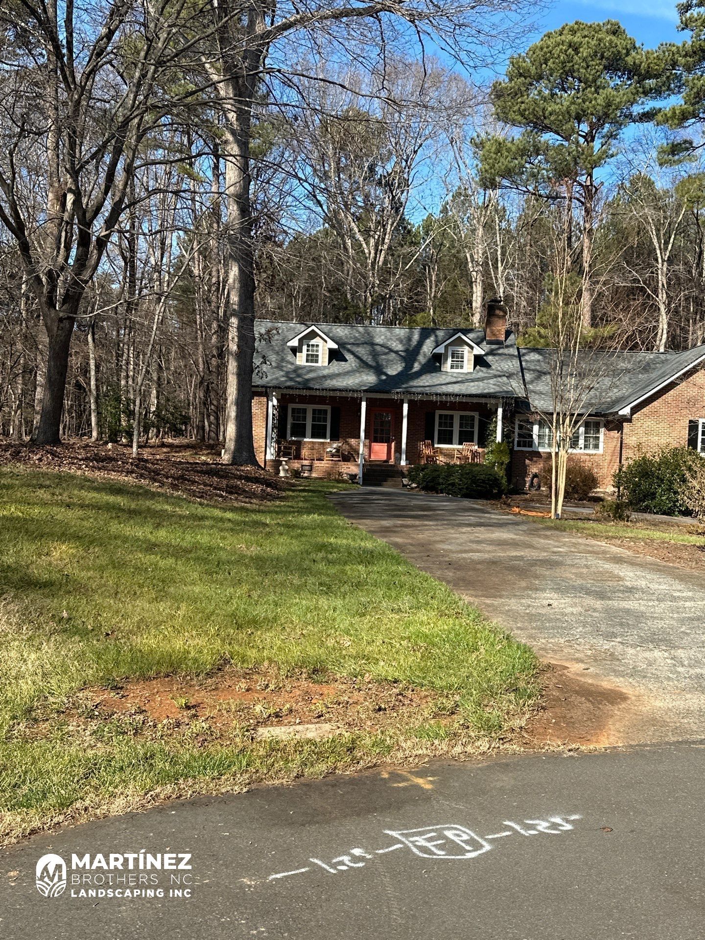 Leaf removal from gutters and yard by Martinez Brother’s Nc Landscaping Inc