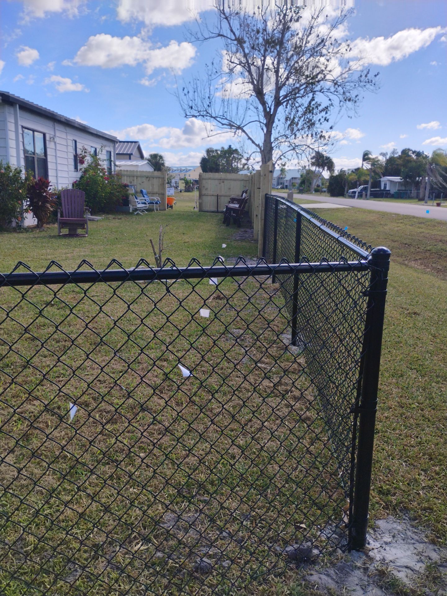 Wood and Chain Link Fence in Port Charlotte by True Fence LLC
