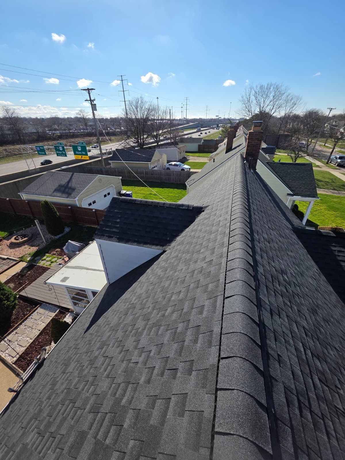 Cleveland Roof replacement - Charcoal shingles by Atlas Roofing & Restoration