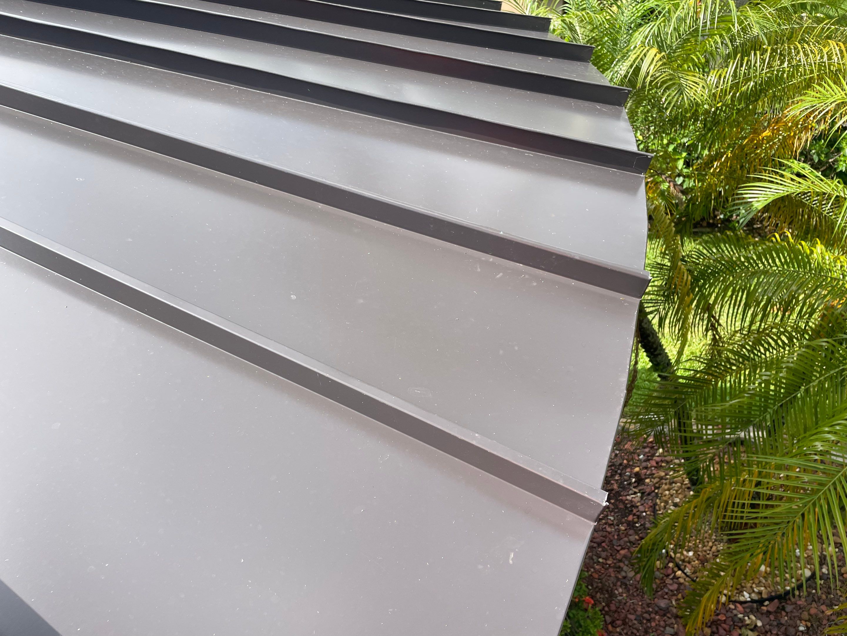 24ga 1.5" Mechanical Seam Dark Bronze by Total Roofing System The Metal Roof Experts