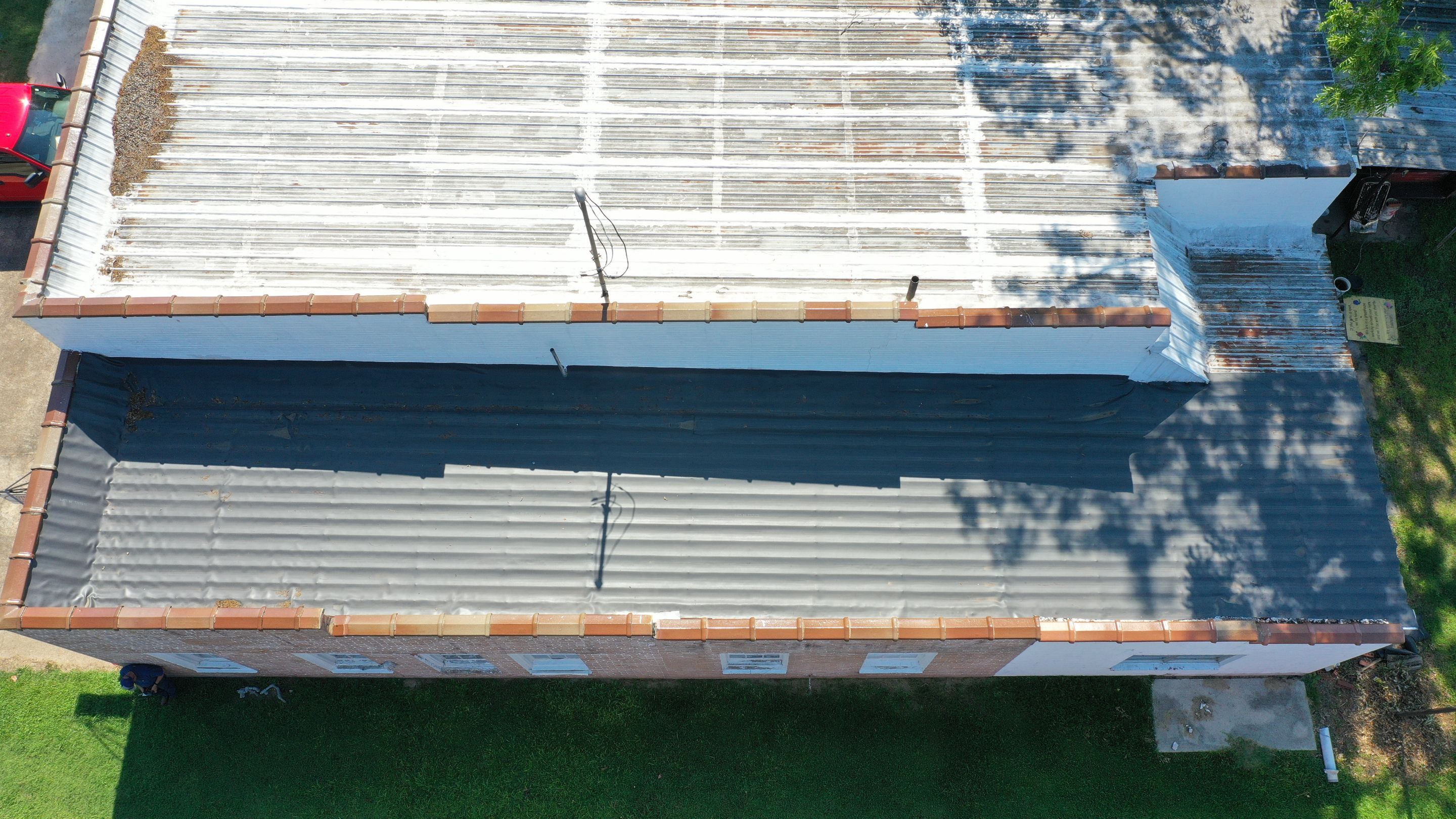 Commercial Roofing Installation using Aldocoat Coatings by Hostetler Roofing
