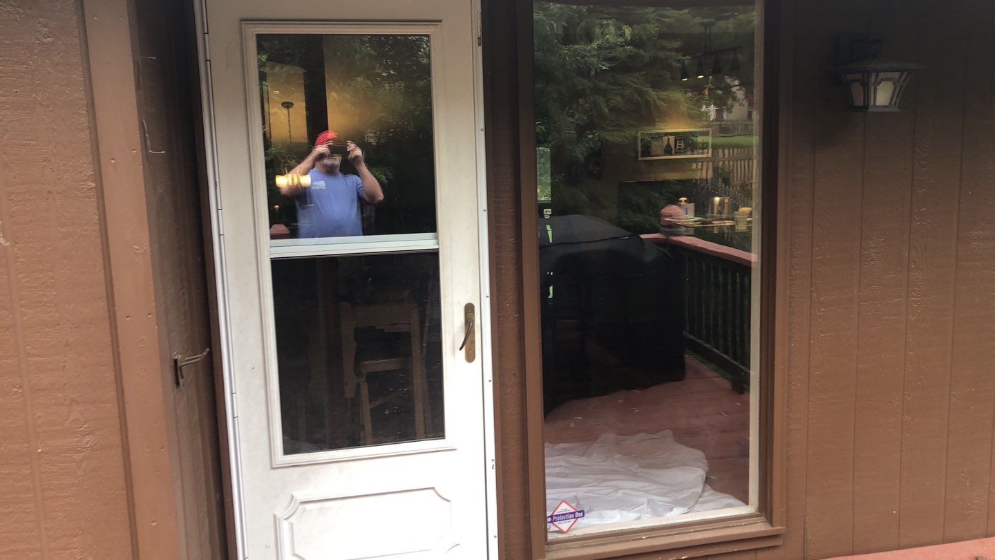 Siding Installation using Heartland Patio Door by EEC  Windows, Siding & Roofing 