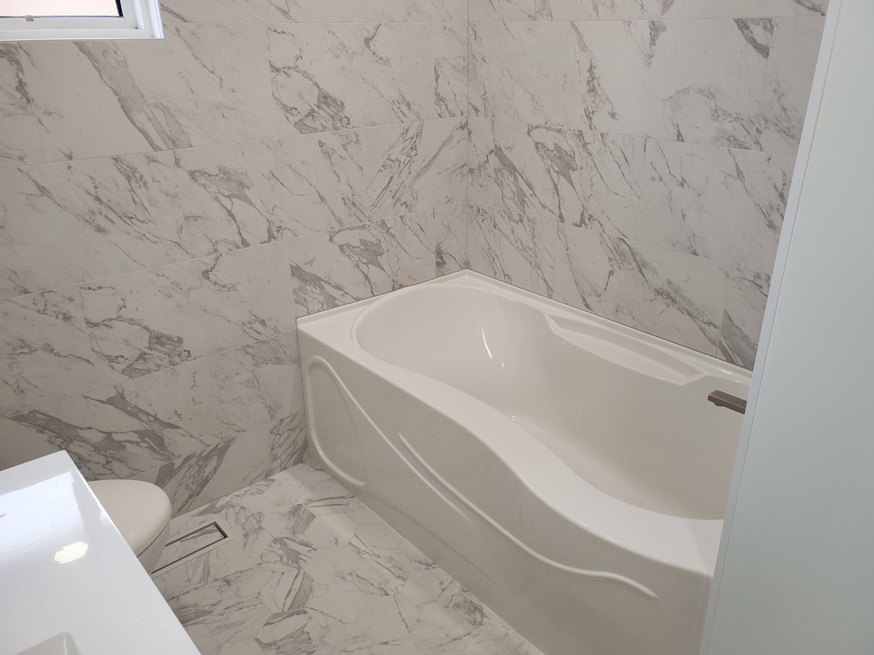 Bathroom Renovation by Impact Construction Sudbury