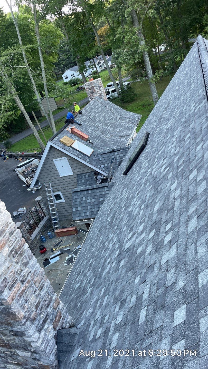 Roof Replacement using IKO Dynasty by American Home Contractors