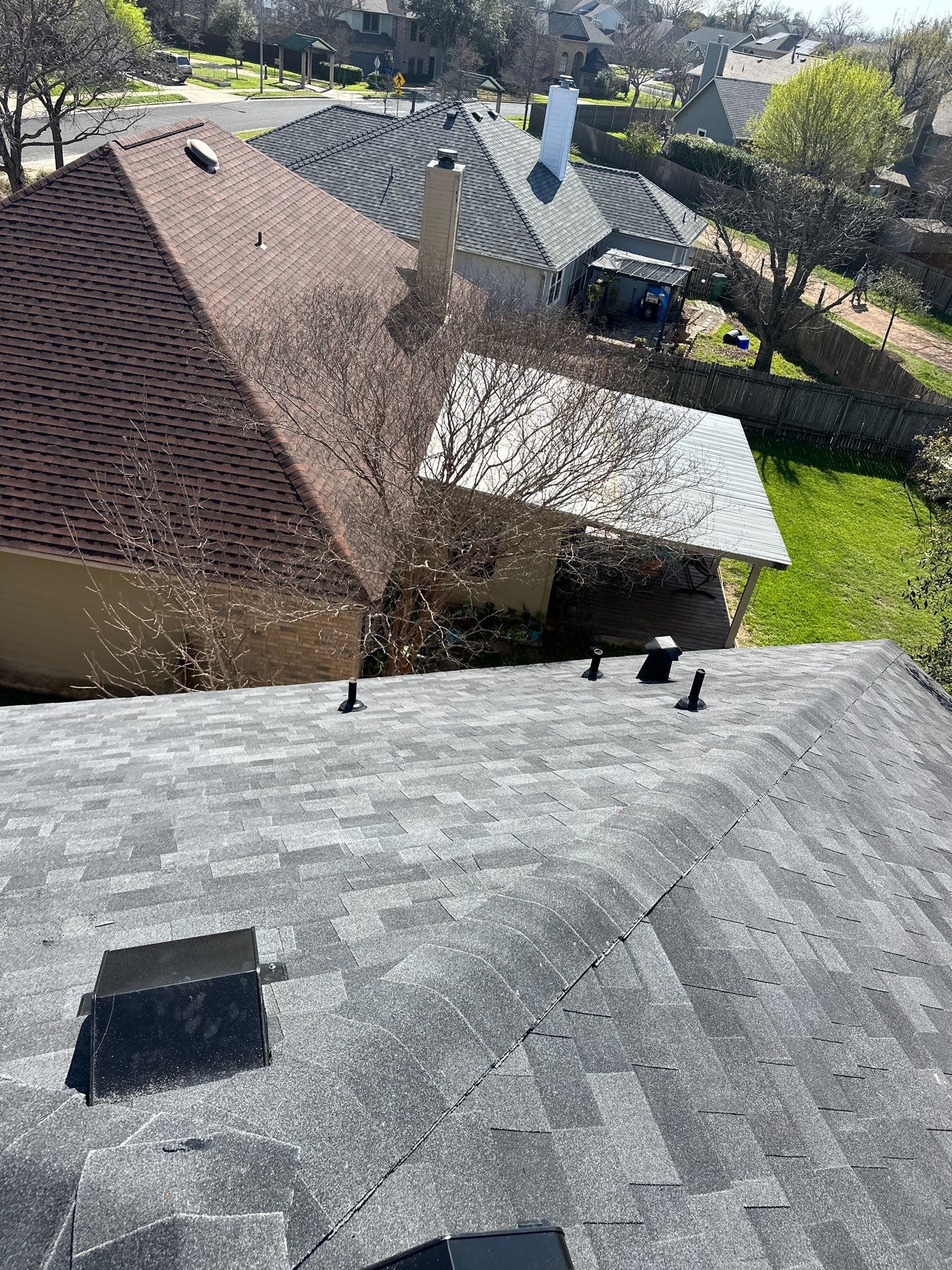 Residential Roofing Installation using Malarkey Vista Class 3 Matte Black by DeZign Roofing & Exteriors