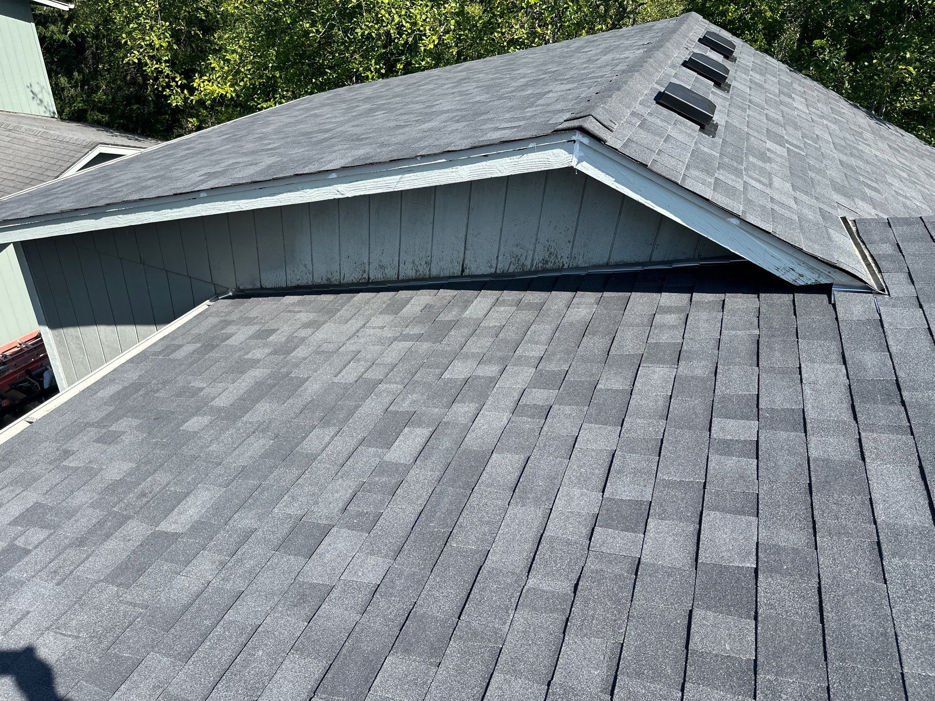Residential Roofing Installation using Malarkey Highlander (Color: Midnight Black) by Orezona Building & Roofing Company, Inc.