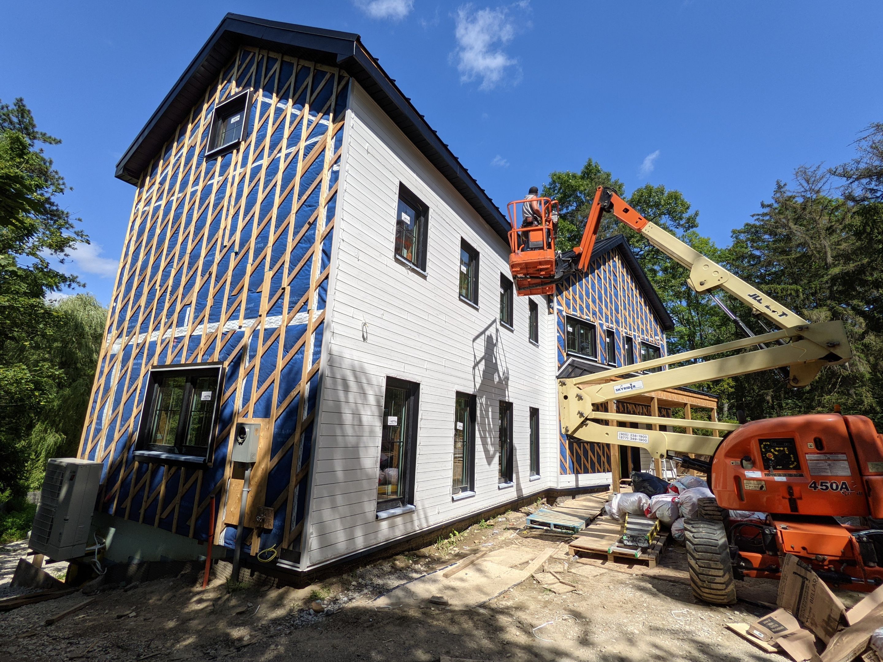New Home Construction using 16" Standing Seam Panels by Jay Carter Roofing & Sheet Metal
