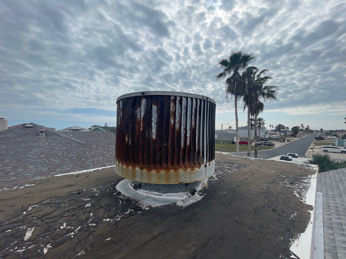 Residential Roofing Repair using Galvanized Chimney Cap & Chase by Lighthouse Roofing