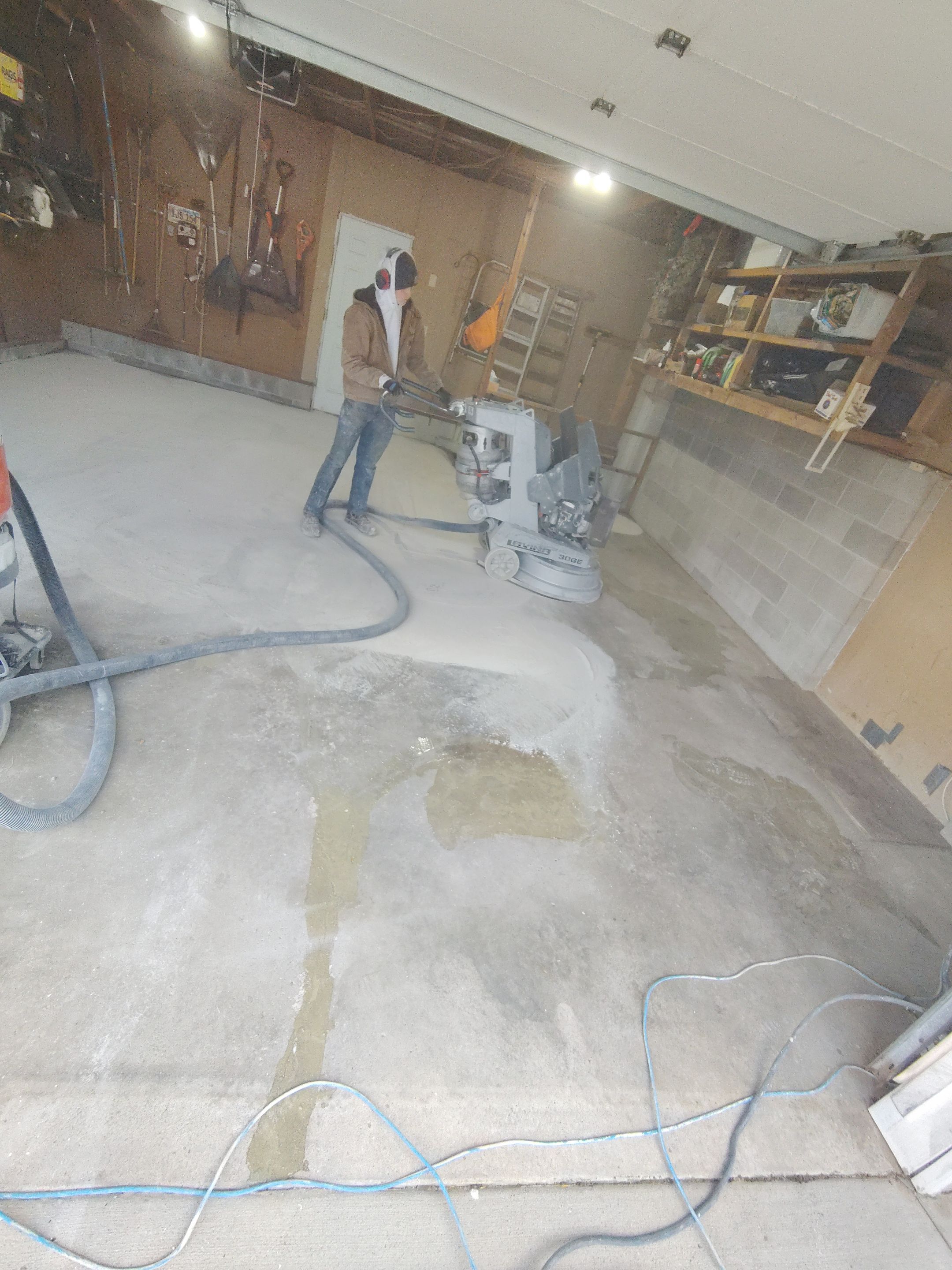 Sioux Falls Garage Epoxy Floor Installation and Concrete Crack Repair by Select Painting, Coatings & Garage Cabinets