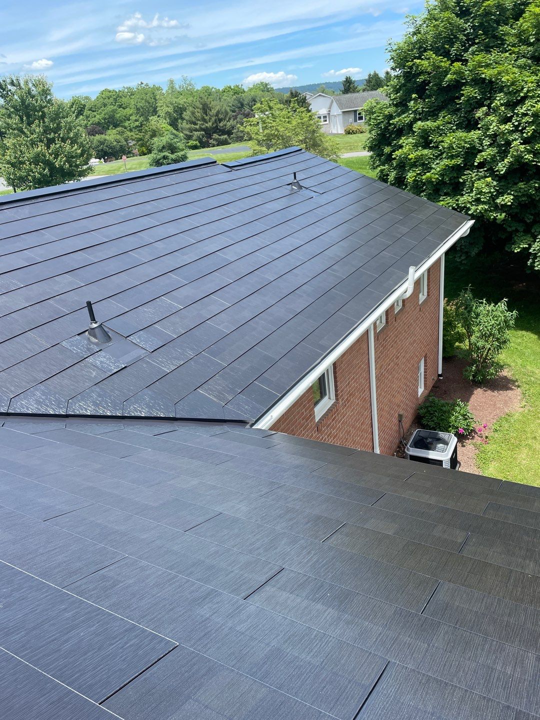 Tesla Solar Roof Installation by American Home Contractors