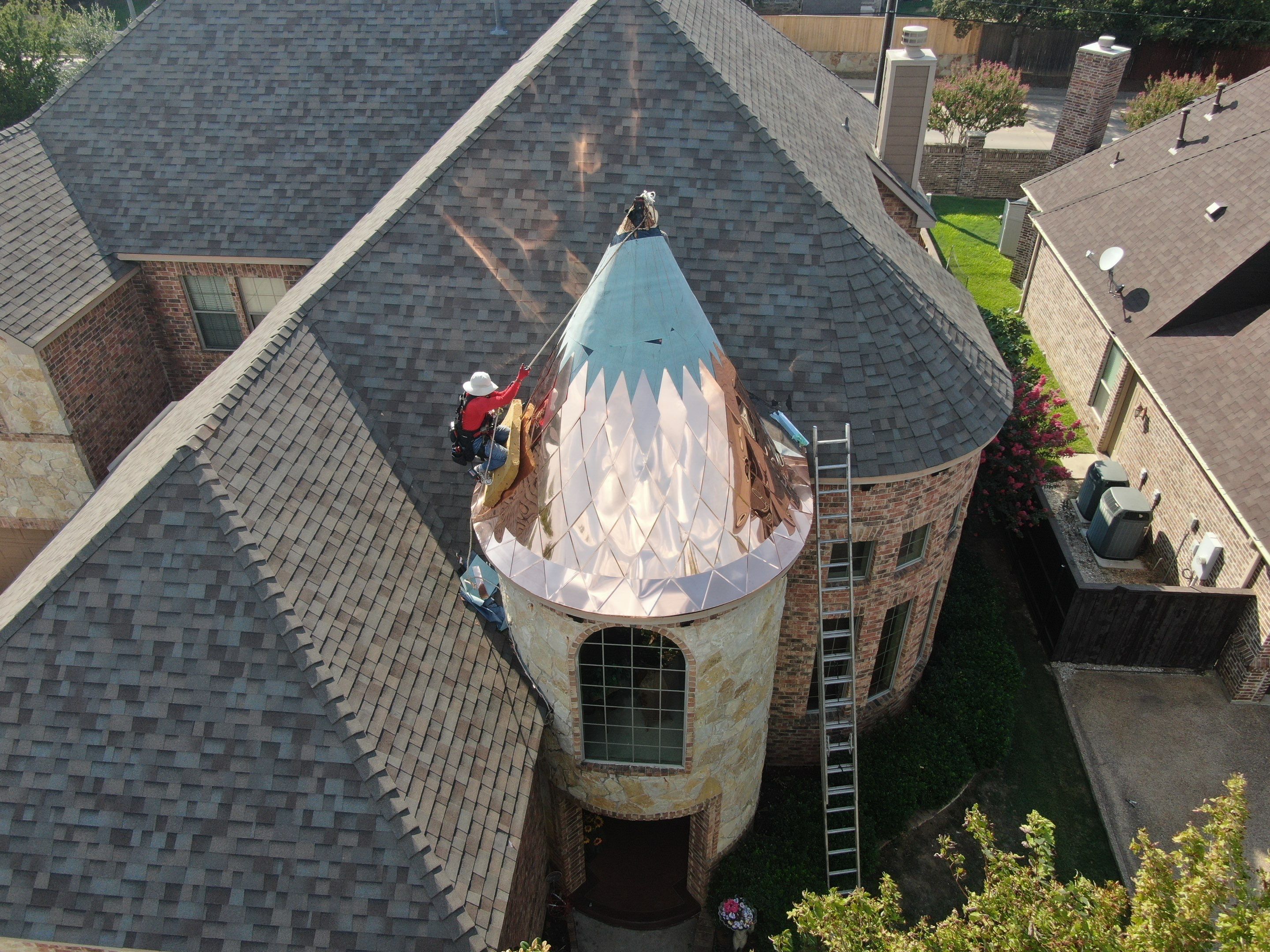 Installing Custom copper turret and Malarkey Vista Class 4 shingles Hail Damage Upgrade by Becker Roofing and Exteriors