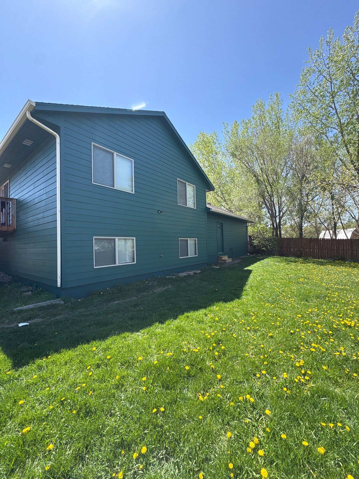 Full Exterior Residential Painting and Siding Refresh in Sioux Falls by Select Painting, Coatings & Garage Cabinets