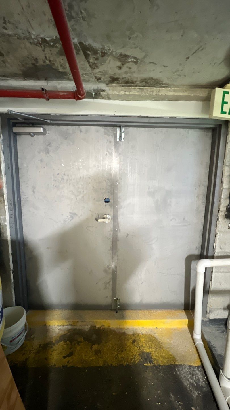 Commercial Stairwell Door Replacement & Hollow Metal Door Retrofit – Pompano Beach High-Rise by The Door Doctor of South Florida, Inc.