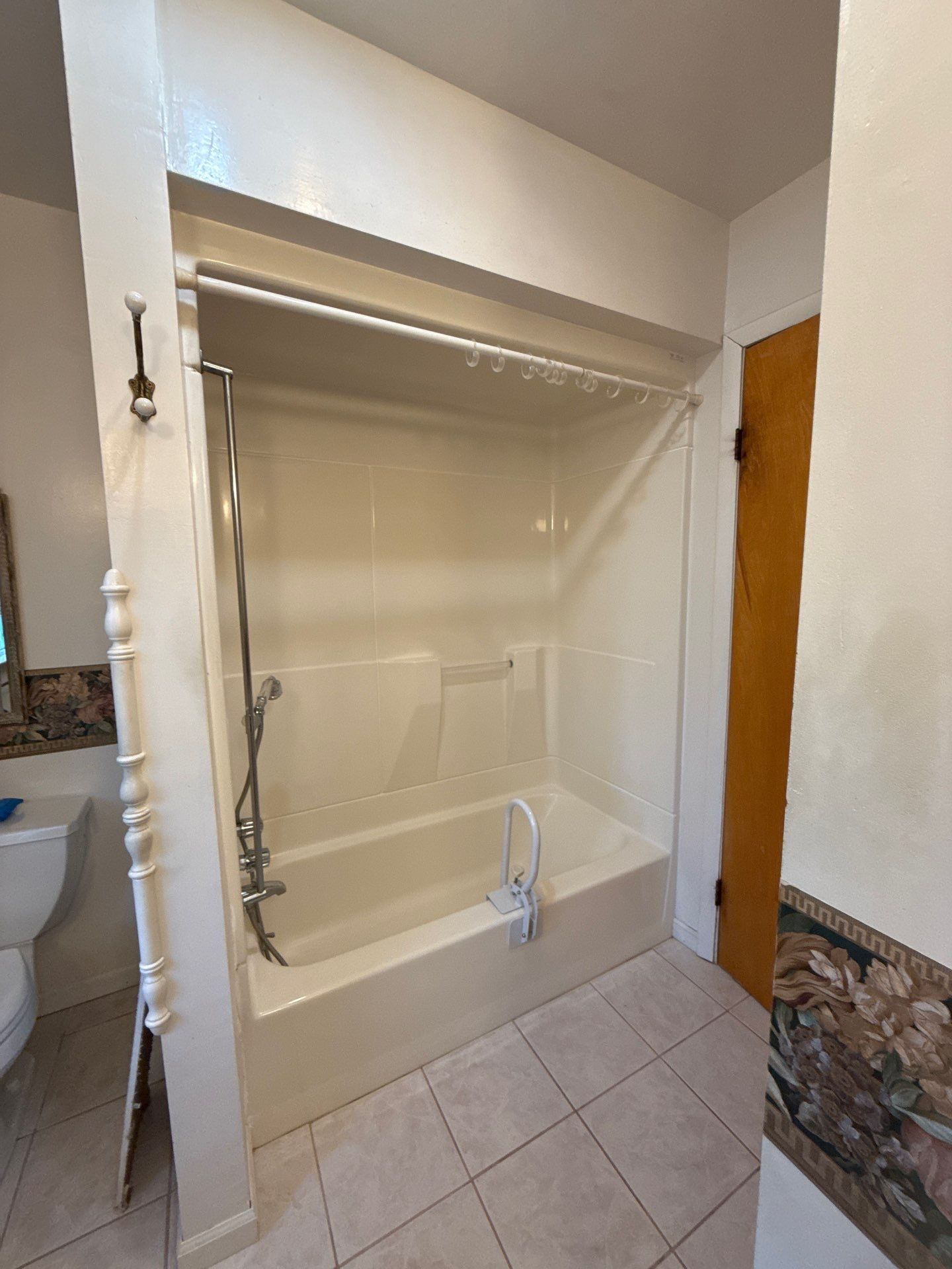 Jacuzzi Walk-In Shower Installation with Safety Grab Bars in Cadillac by Rainbow Seamless Systems