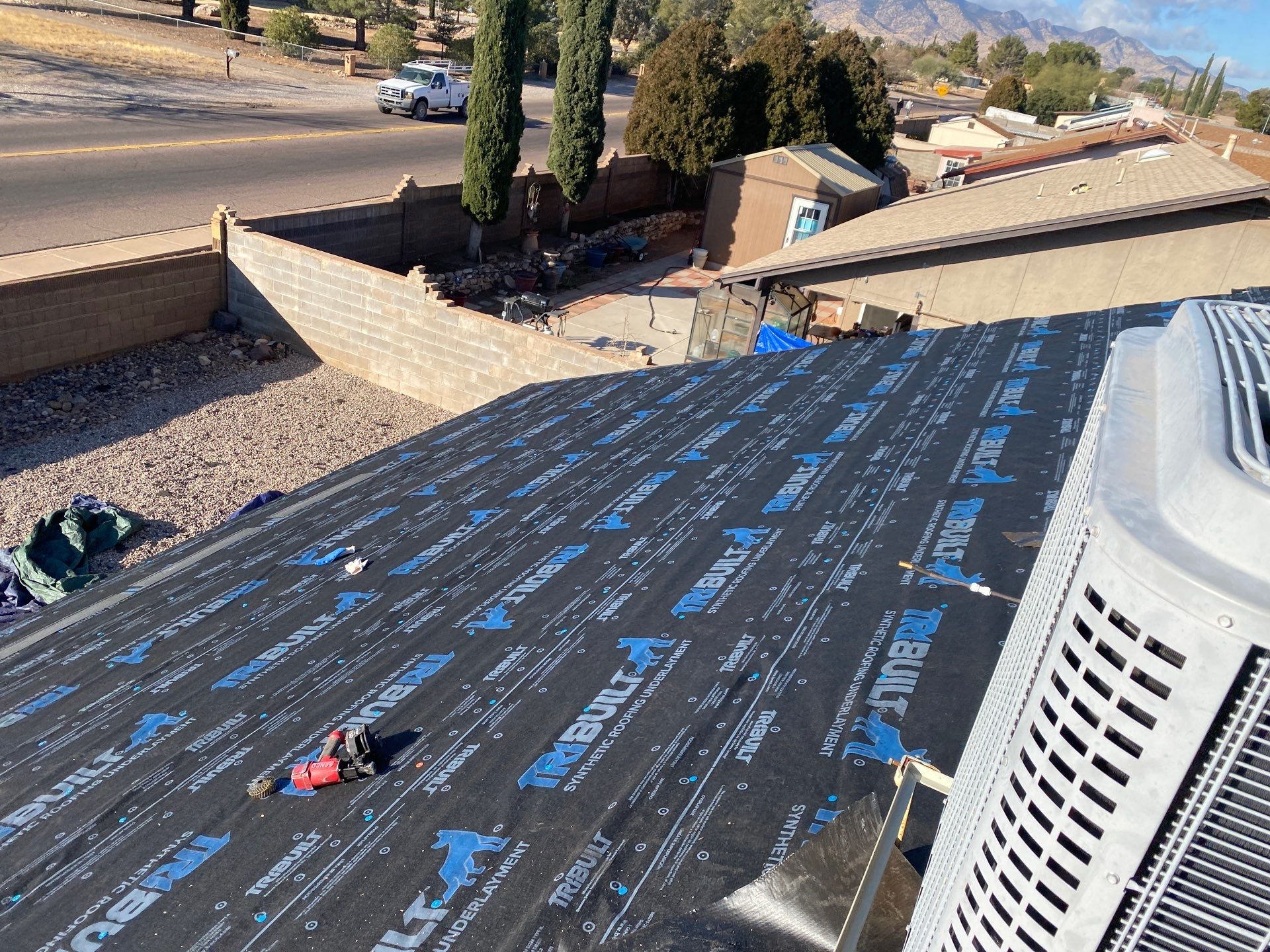 Onyx Black Shingles by Reimagine Roofing
