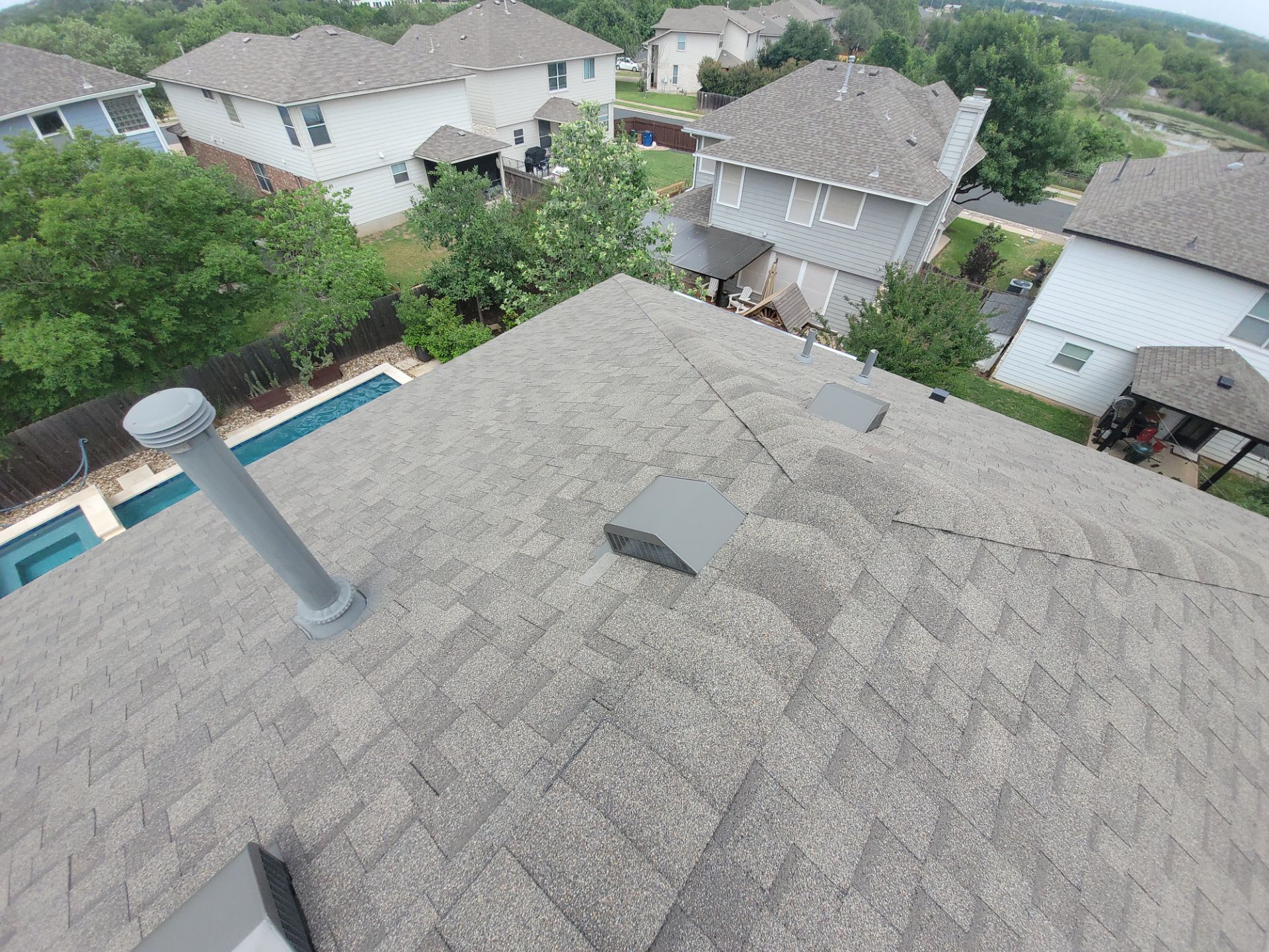 Residential Roofing Installation using IKO, Cambridge and gutters by Oakwood Roofing and Construction, LLC