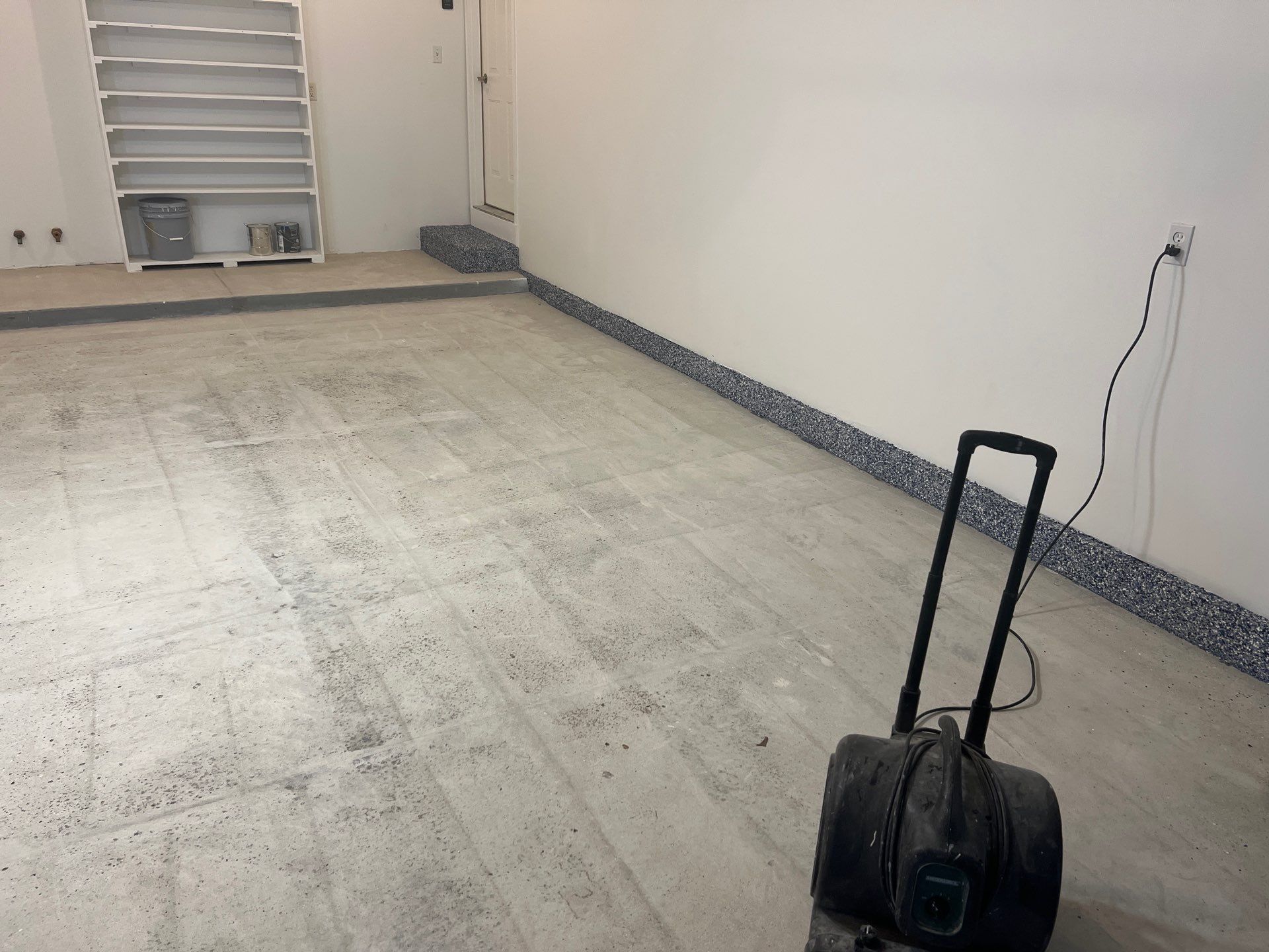 Custom Epoxy Flake Floor and Garage Wall Renovation in Ada by Gordon Painting