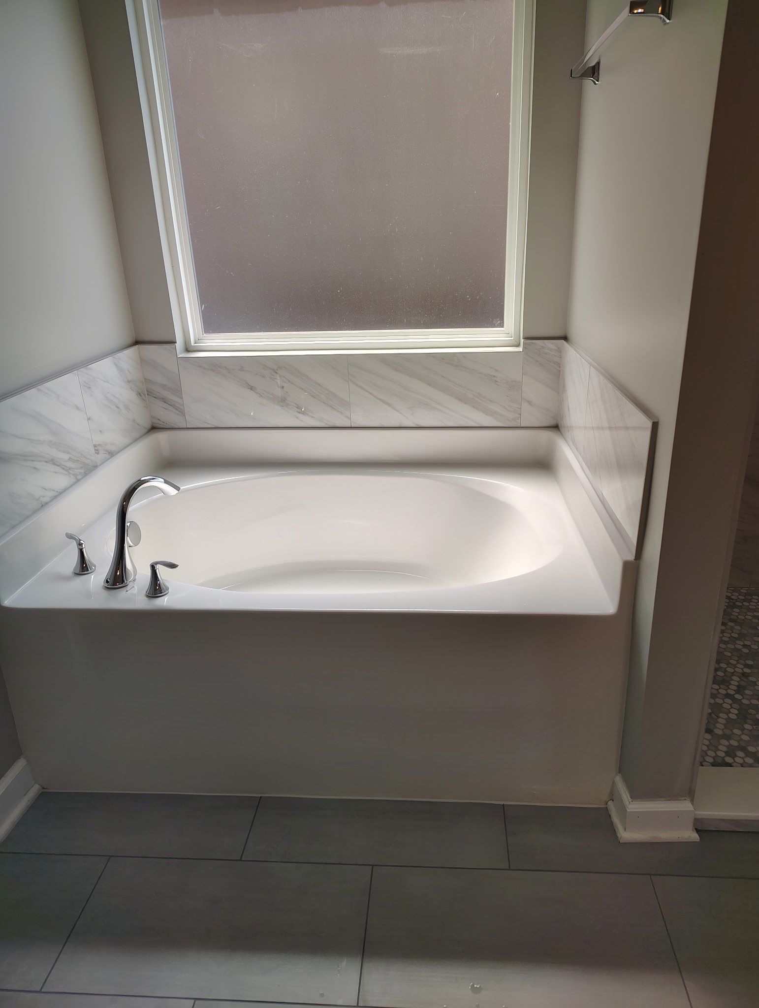 Tile shower remodel and heated floors by Footprints Floors of Nashville