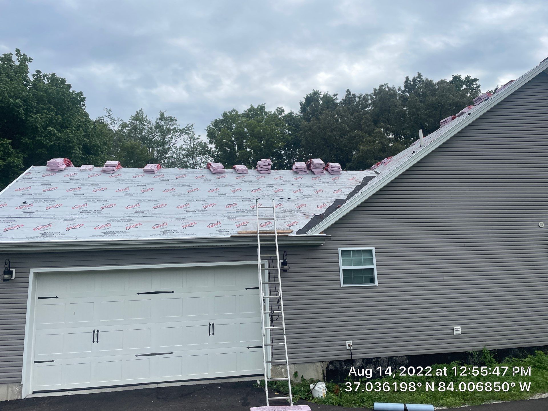 Residential Roof Installation by KISH RESTORATION 