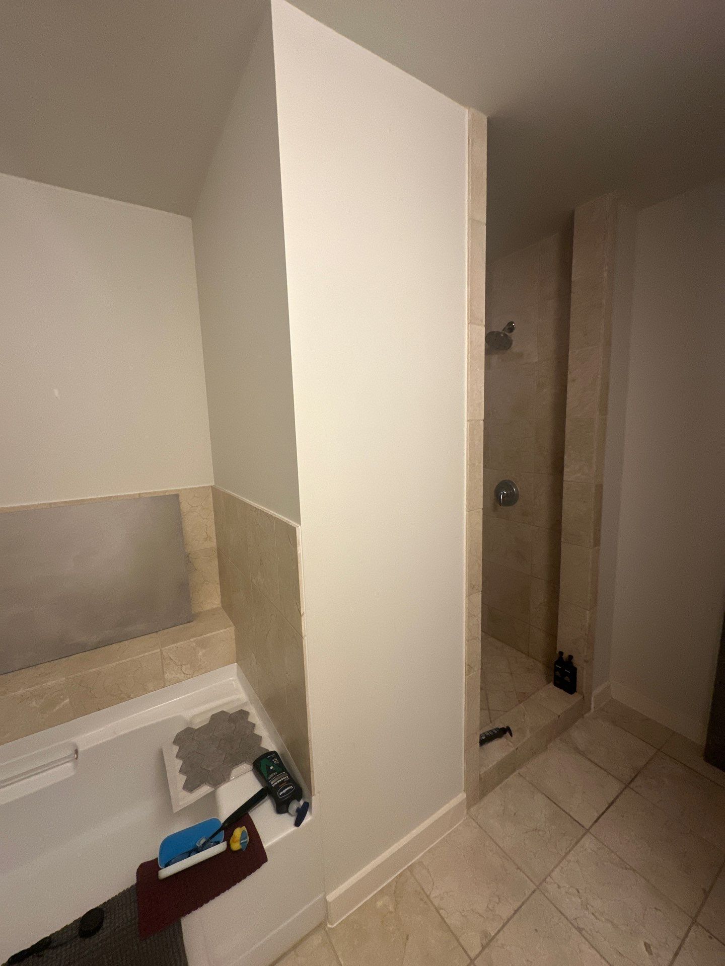Modern Bathroom Transformation by Fine Line Flooring Inc.