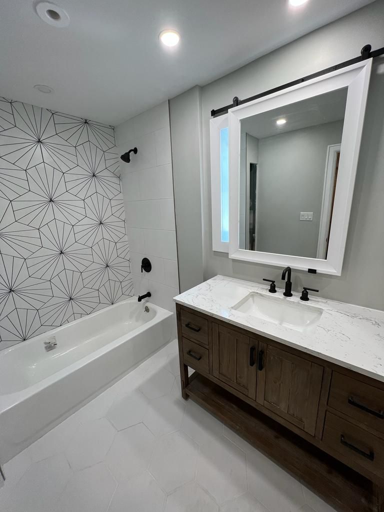 Kids bathroom Upgrade by Cedar Contractors Group, Inc.