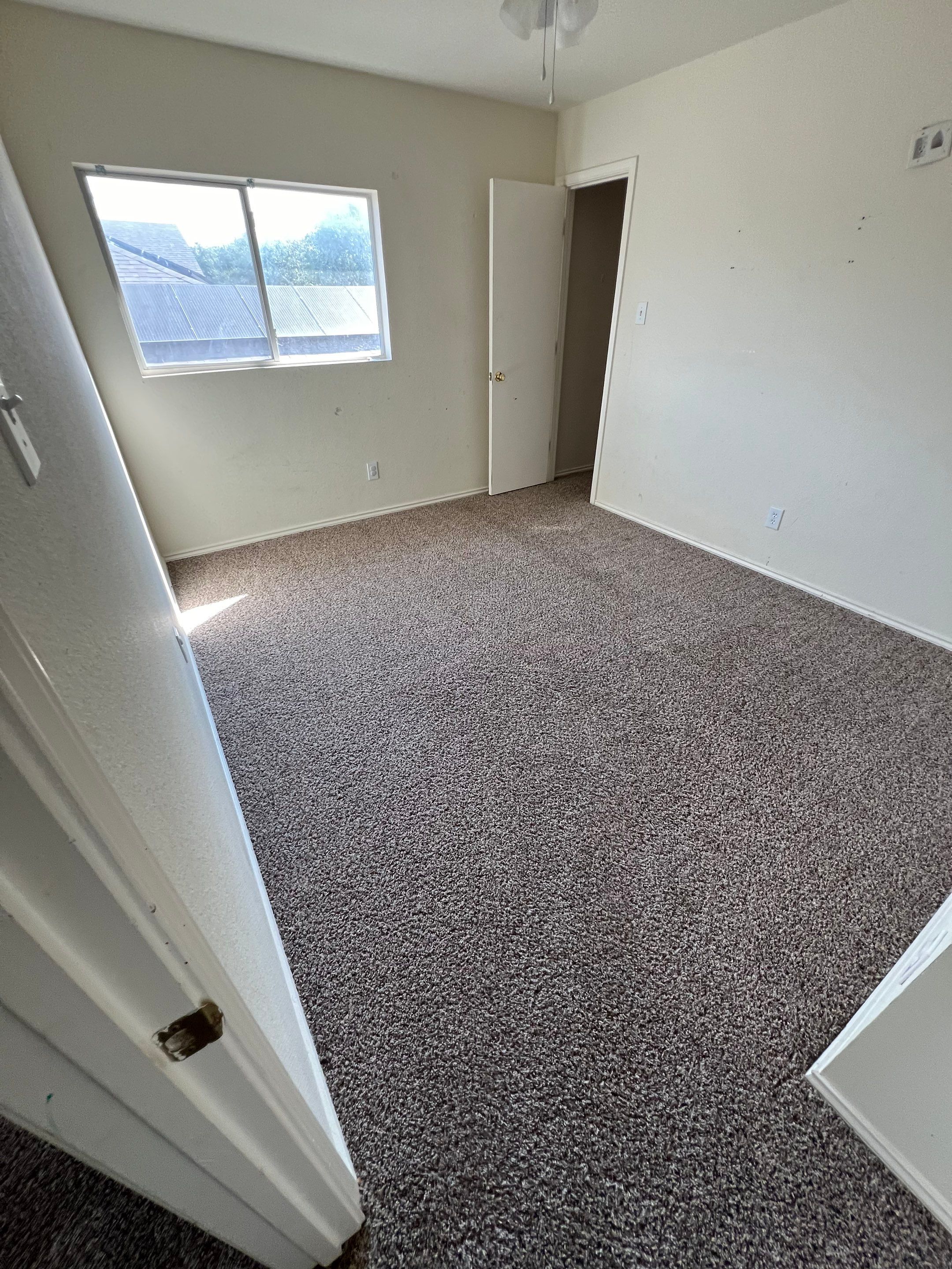 the service being done is carpet cleaning in a residential bedroom setting