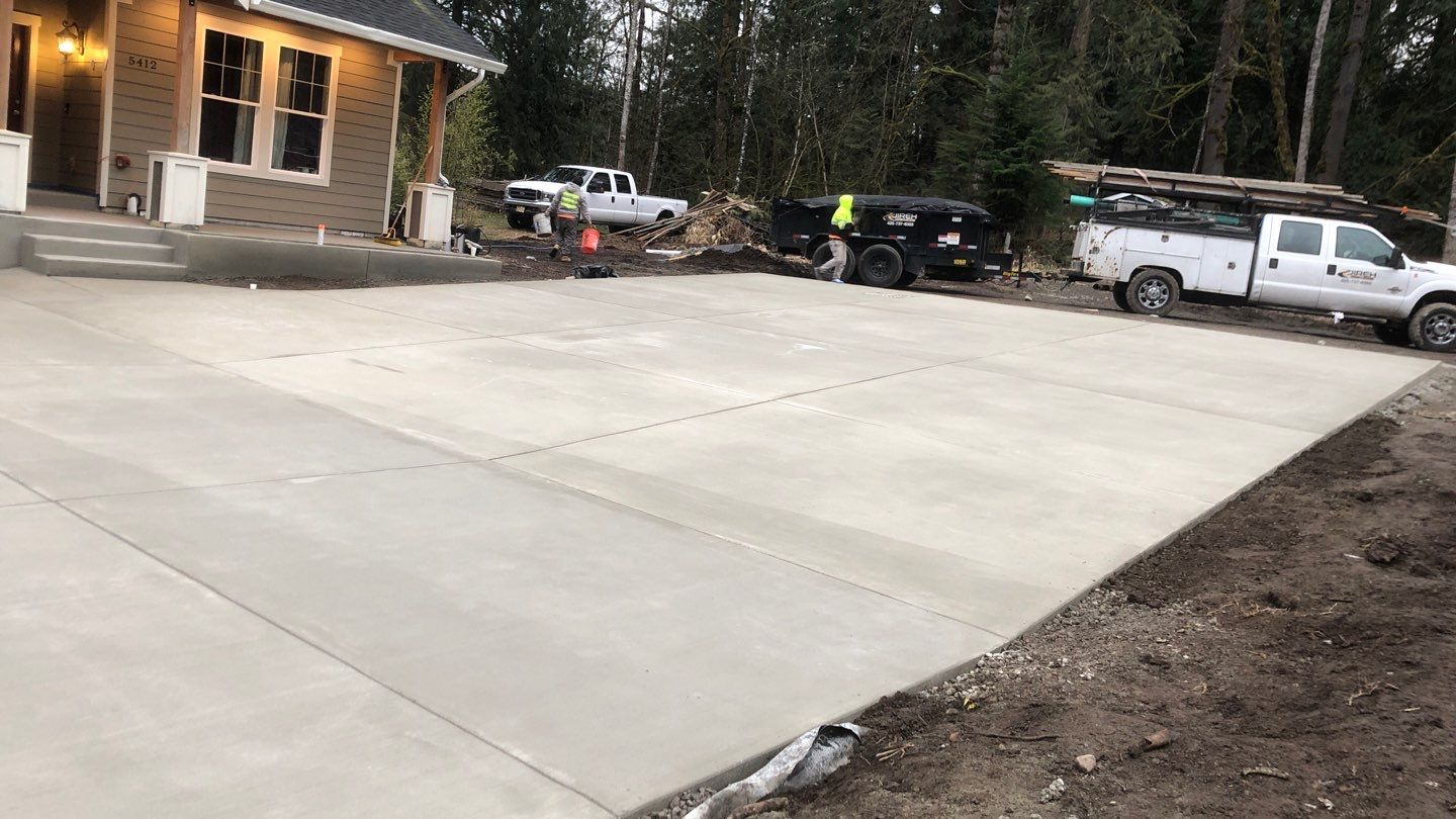 Mandy | Stamped Concrete Patio & Driveway by Jireh Asphalt & Concrete Inc 