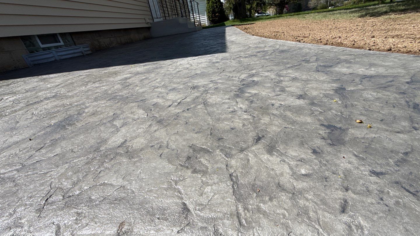 Oxford slate textured patio and step  by NG Masonry & Construction LLC