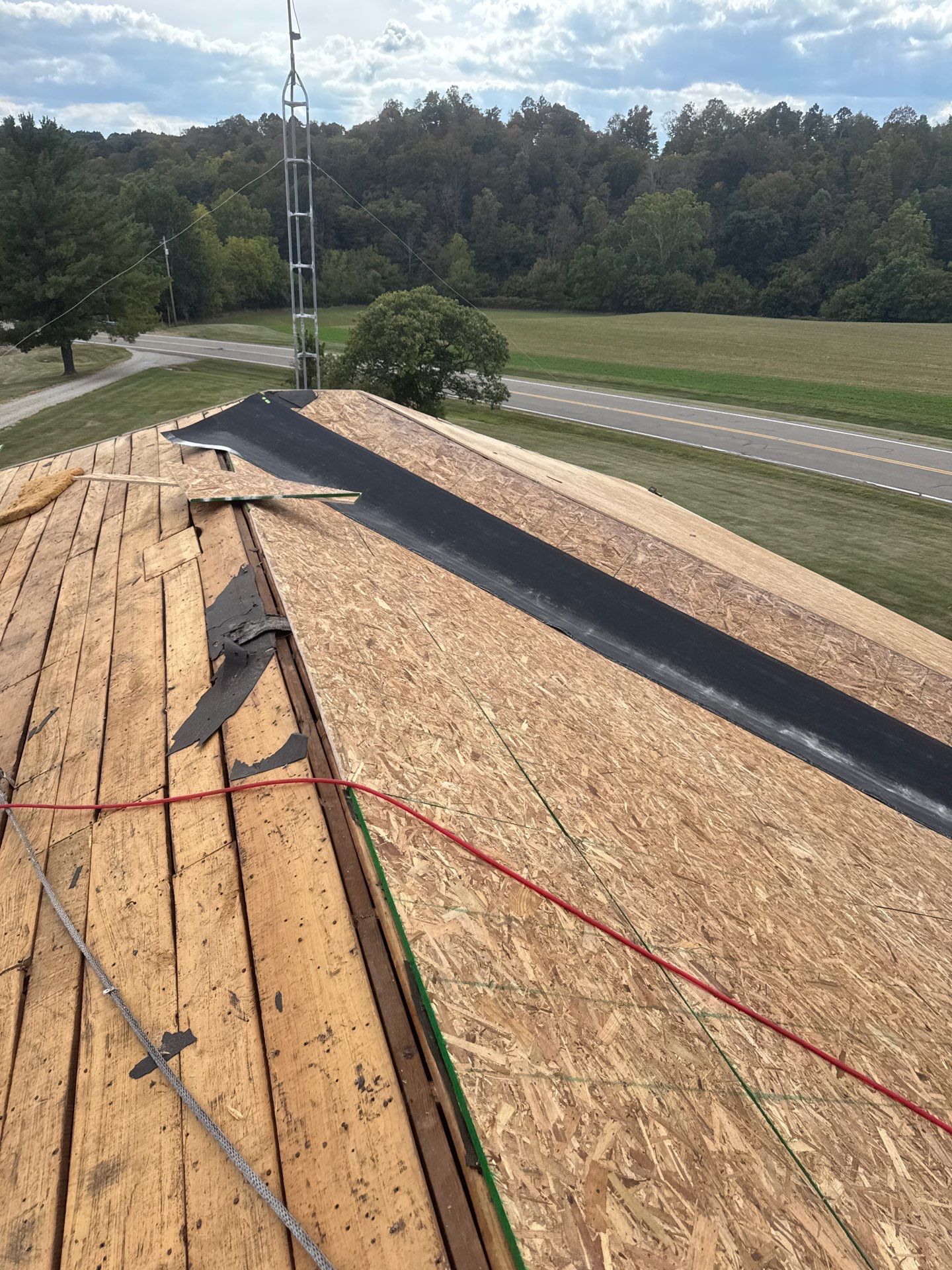 Residential Roofing Installation using GAF Timberline HDZ Charcoal by Rainstoppers Roofing