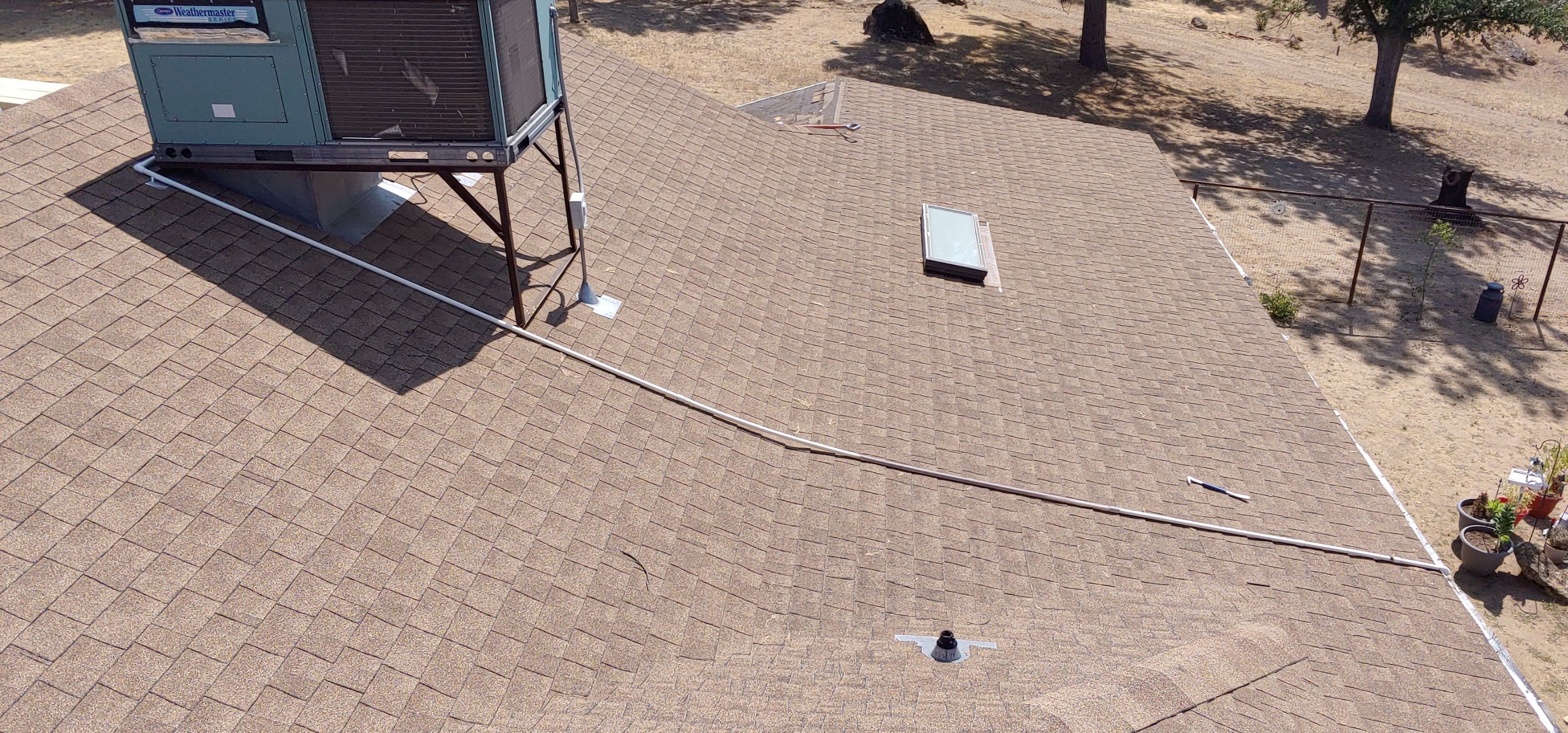 Residential Roofing Installation using Standing seam metal roofing system by Straight Edge Roofing Inc