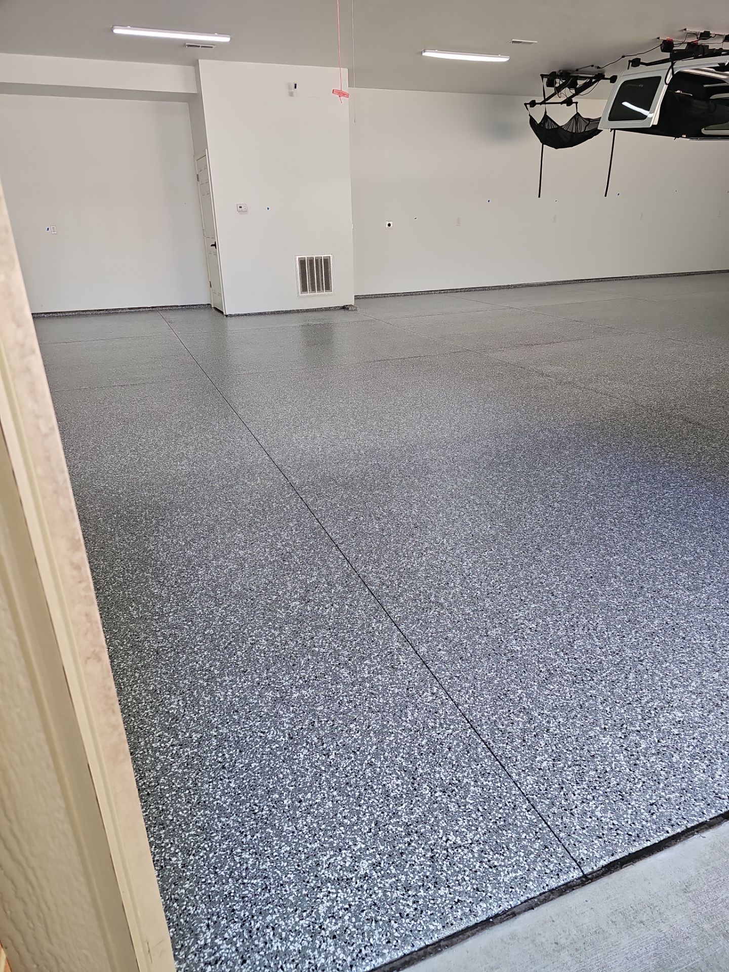Smoke Garage Floor Coating in South Bend! by Innovative Spaces / Innovative Concrete Coatings