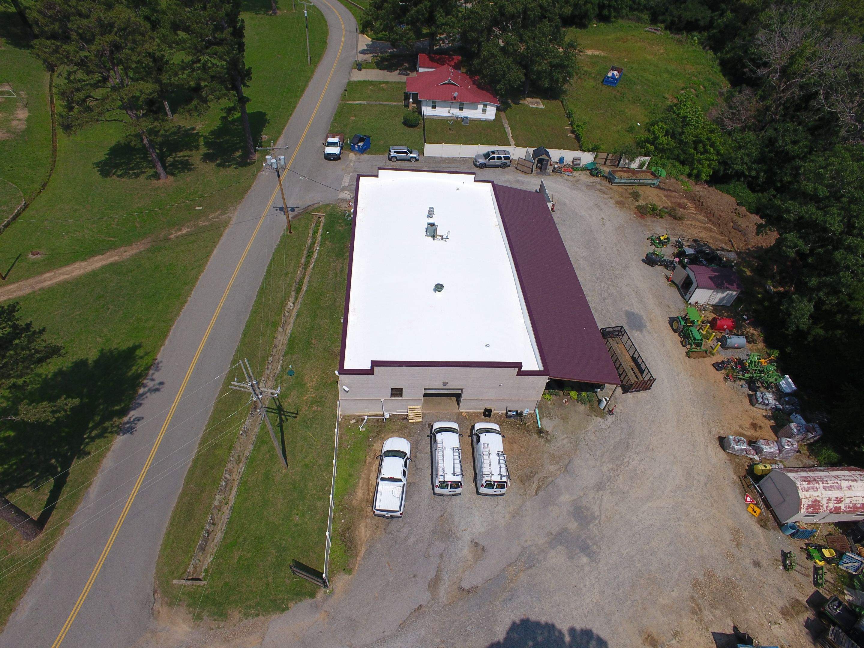 Choctaw Nation Healthcare Center - White Building by Hostetler Roofing