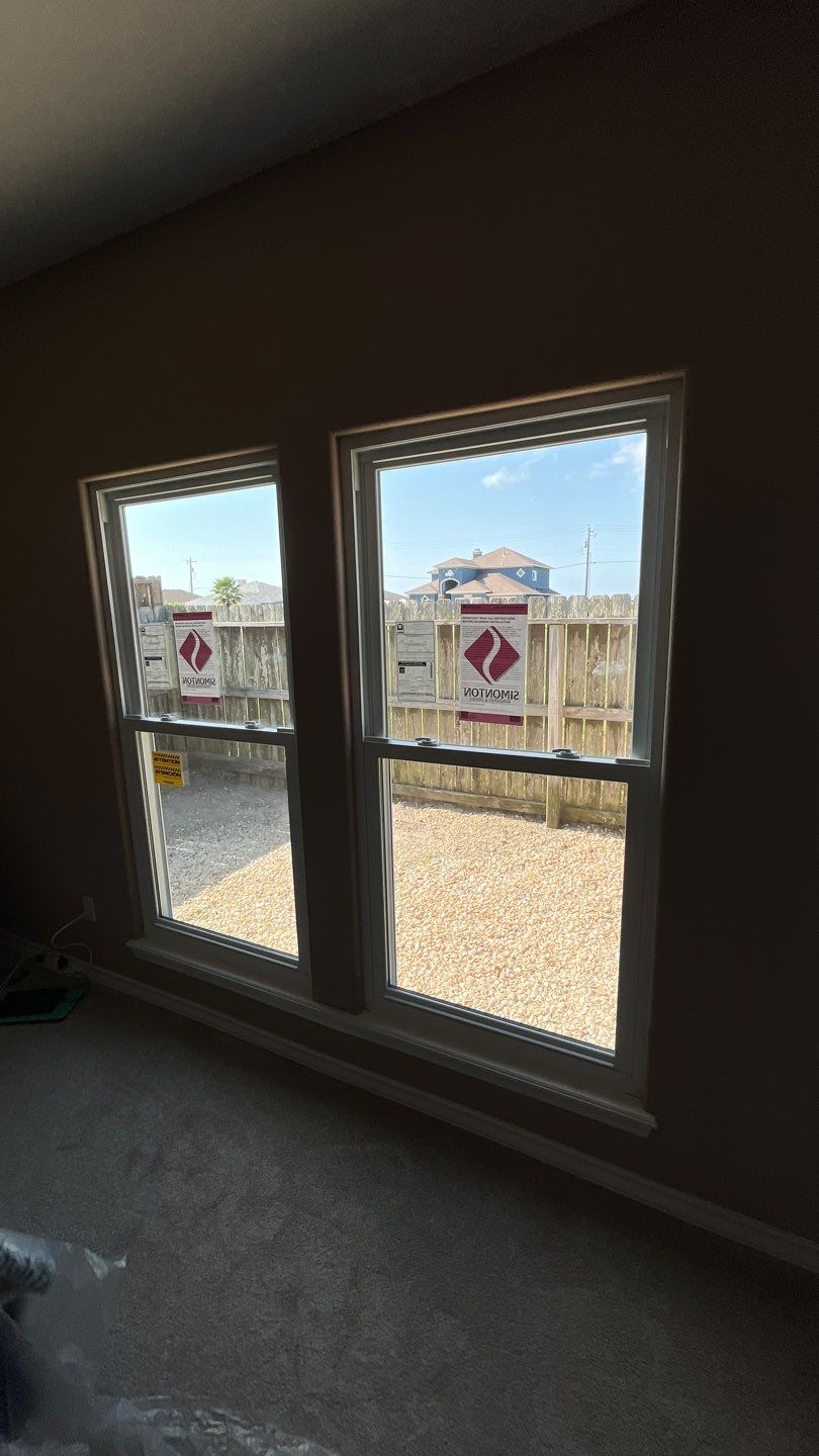 Curved Trim Windows by Bayfront Roofing and Construction