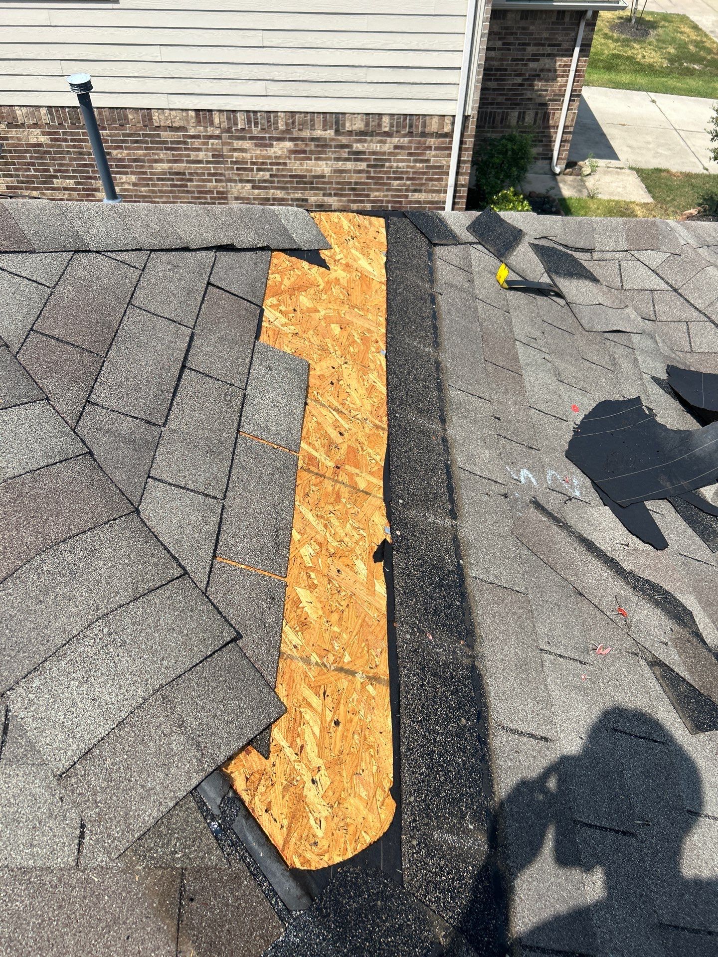 Hail Damage using Owen's Corning Duration (Lifetime) Shingles by Roof Repair Company