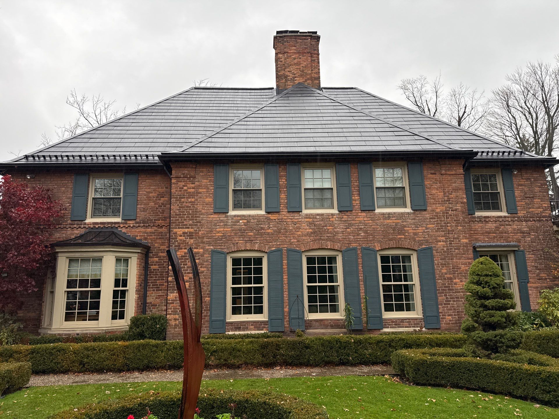 Tesla Solar Roof Replacement  by American Home Contractors