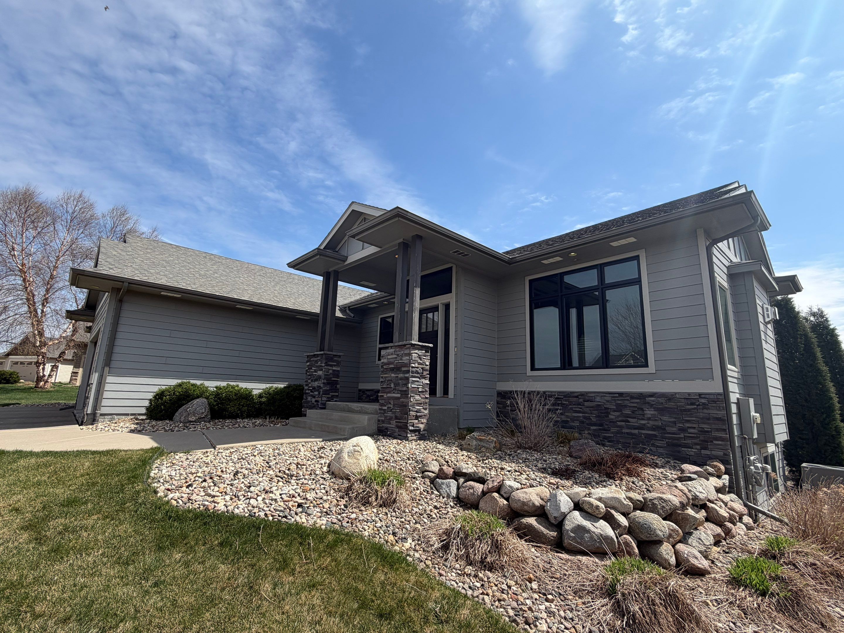 Residential Exterior Painting and Siding Maintenance in Sioux Falls by Select Painting, Coatings & Garage Cabinets
