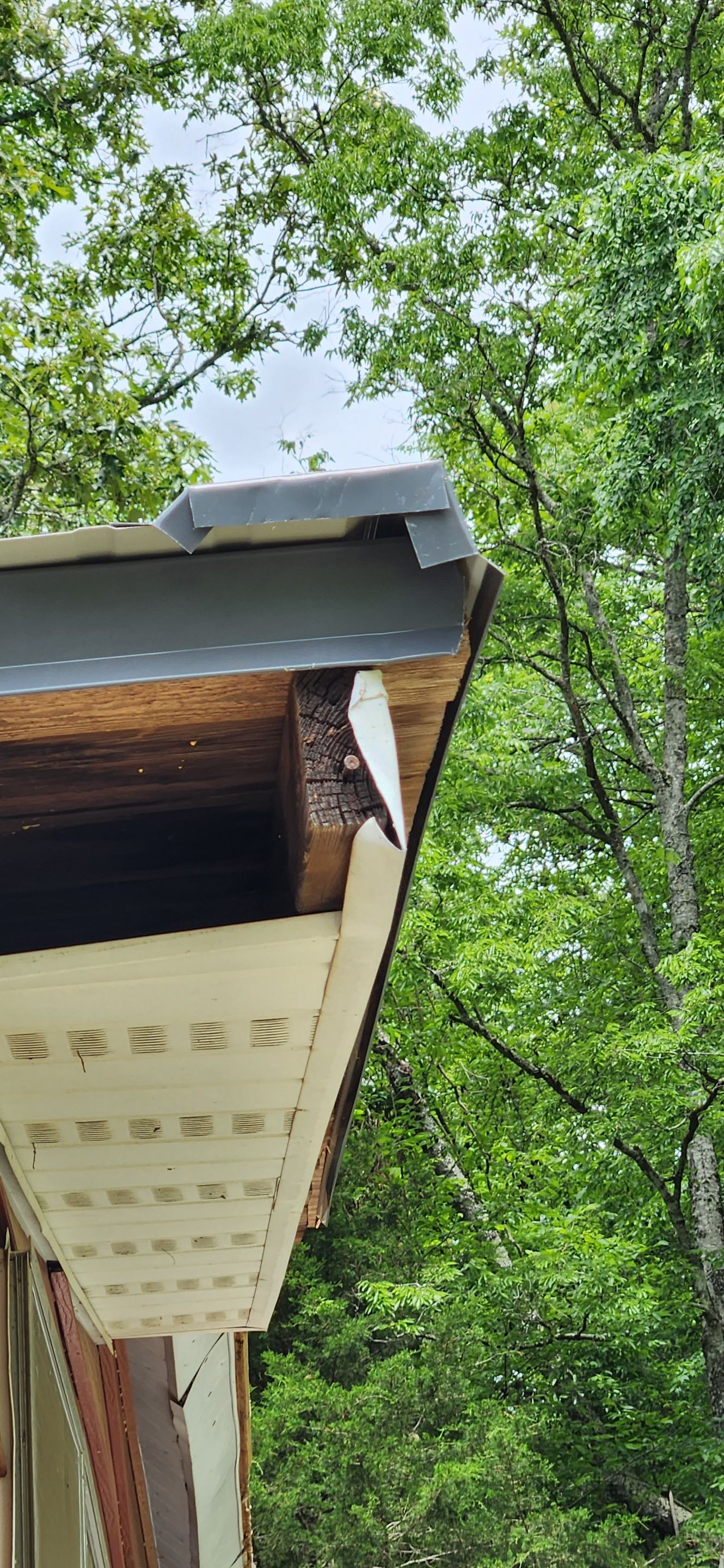 Residential Roofing Installation using 26 Gauge Colored Panels by Hostetler Roofing