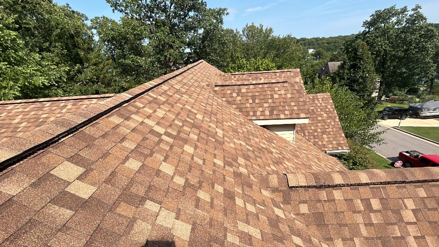 Residential Roof + Gutters & Downspouts & Gutter Guards  by Titan Commercial & Residential Roofing 